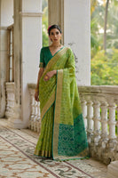 Green Raw Silk Woven Ikat Designer Ceremonial Saree