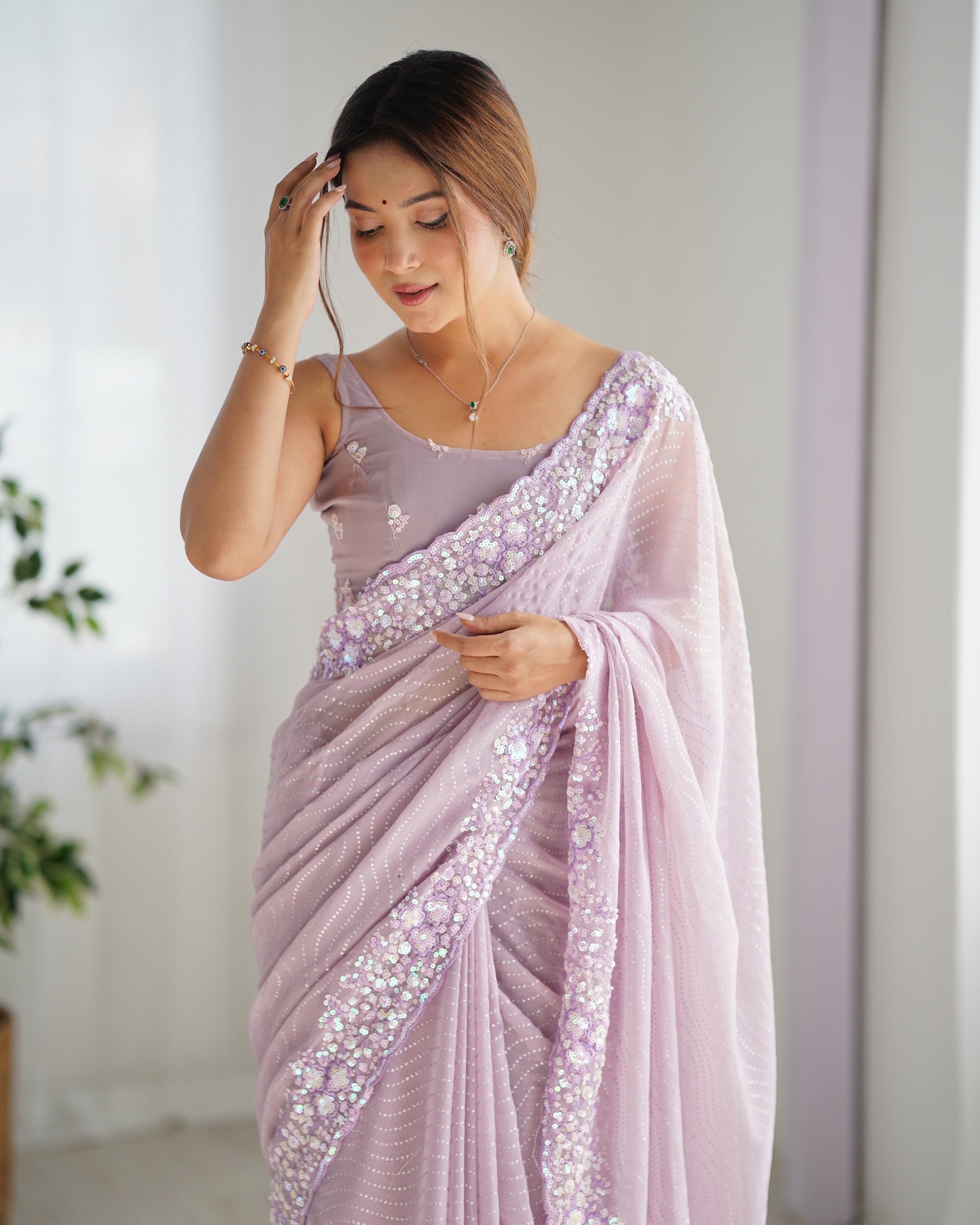 Lavender Georgette Beautiful Partywear Embroidered Saree