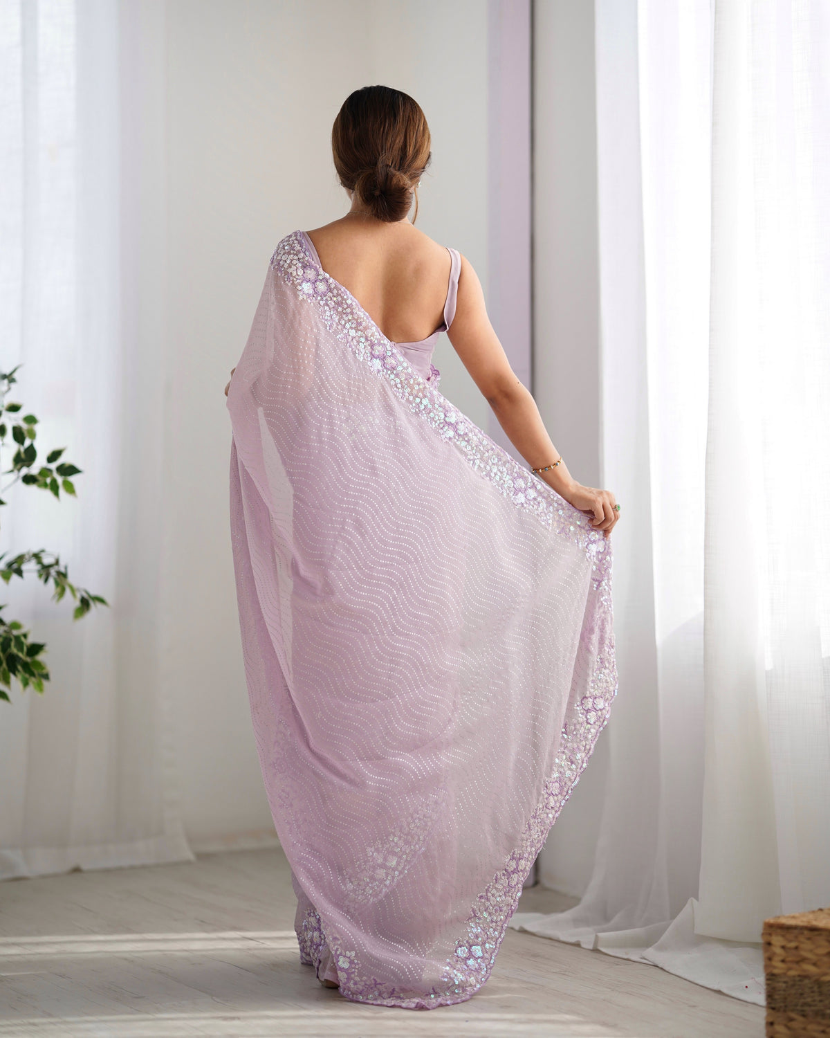 Lavender Georgette Beautiful Partywear Embroidered Saree