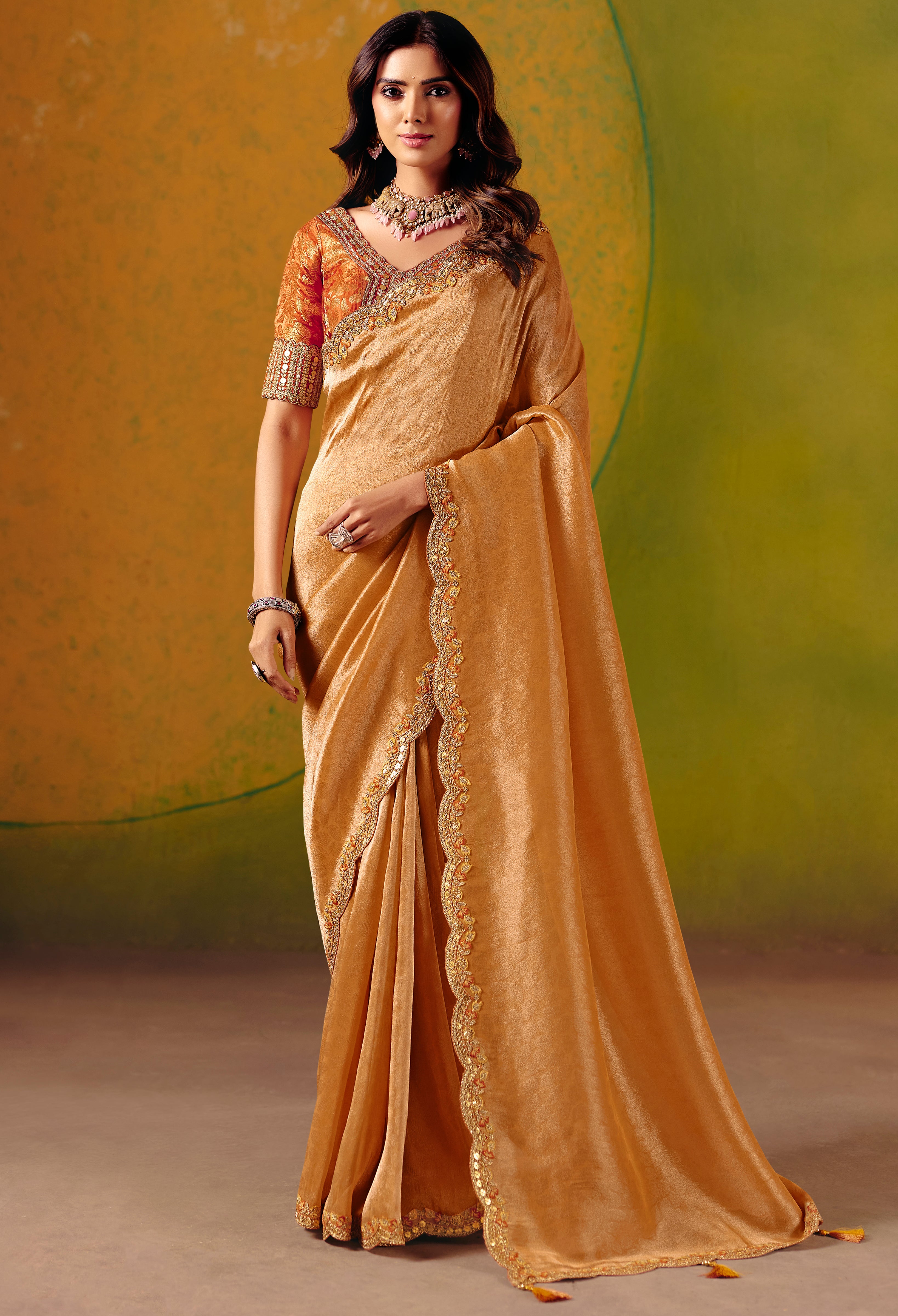 Light Orange Saree With  Zari Weaving With Fancy Work Border