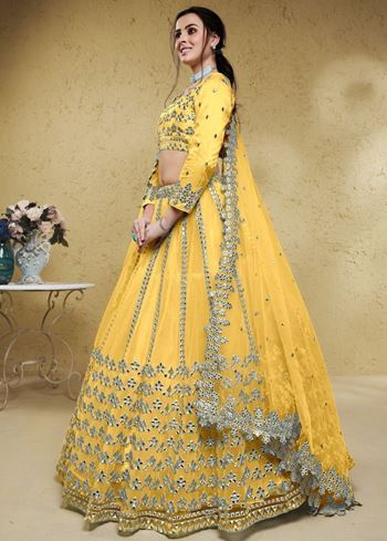 Magnetic Yellow Foil Work Net Haldi Wear Lehenga Choli With Dupatta