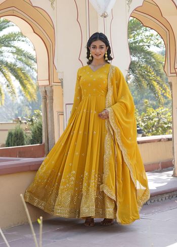 Mustard Faux Georgette Suit With Print