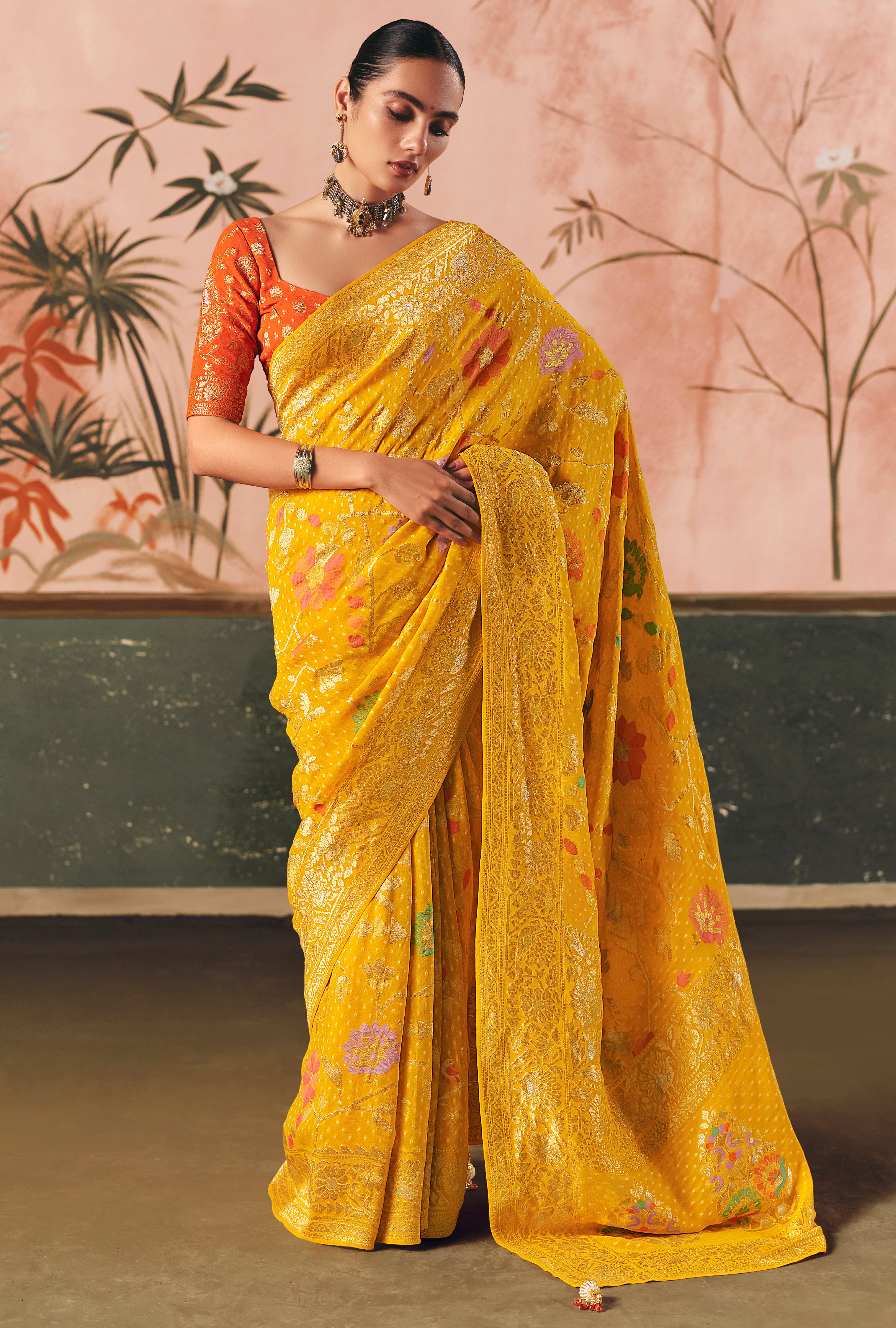 Mustard Saree With  Designer Bandhej Weaving Work With Beutifull Tassles Attached