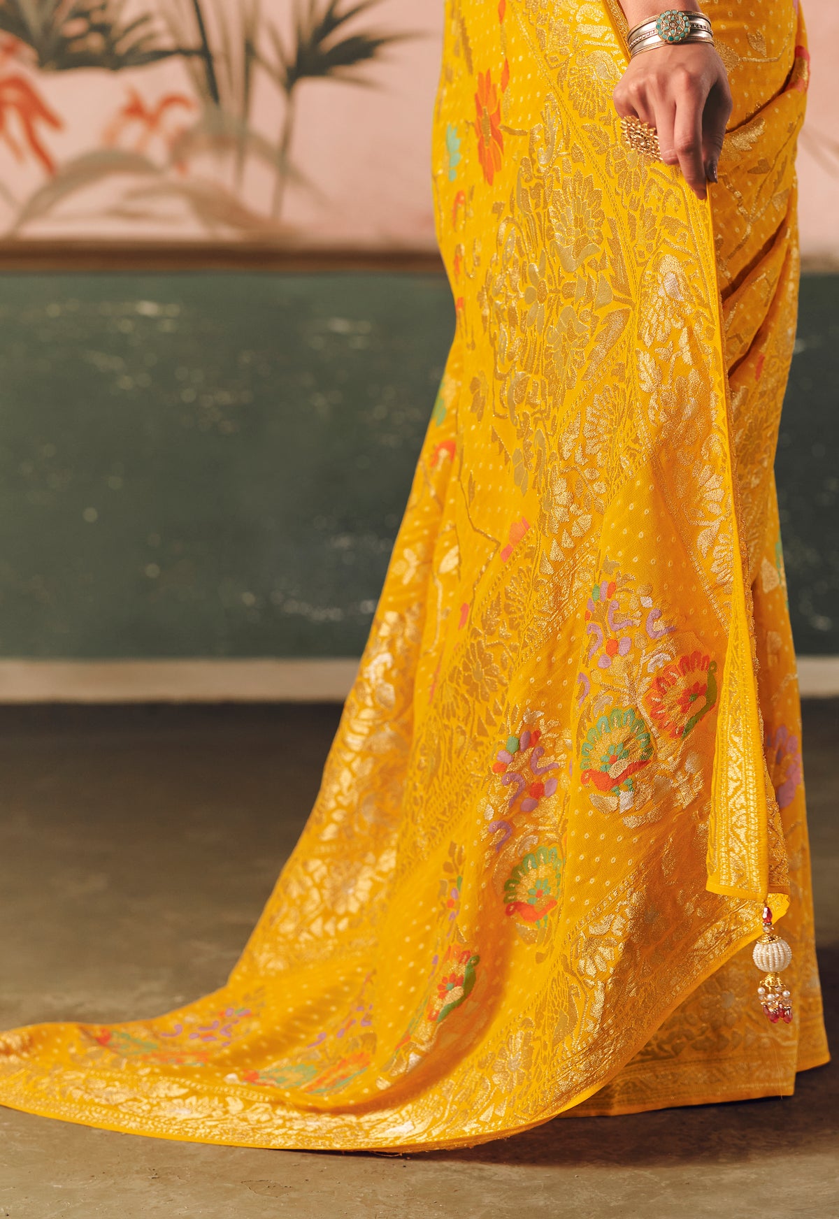 Mustard Saree With  Designer Bandhej Weaving Work With Beutifull Tassles Attached
