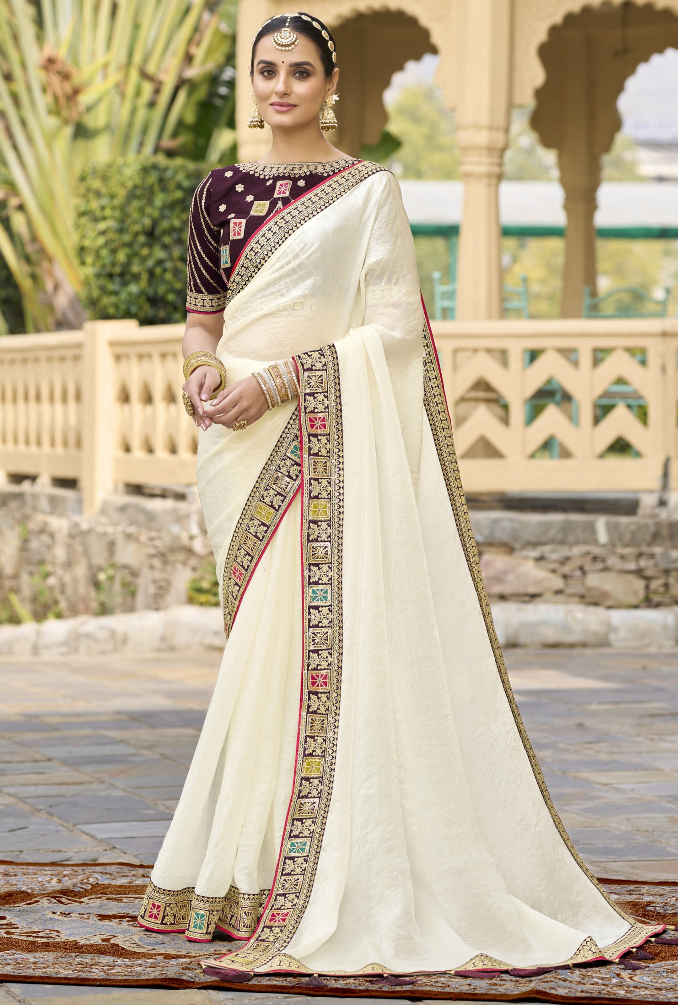 Off White Georgette Plain Saree With Embroidered Lace Border