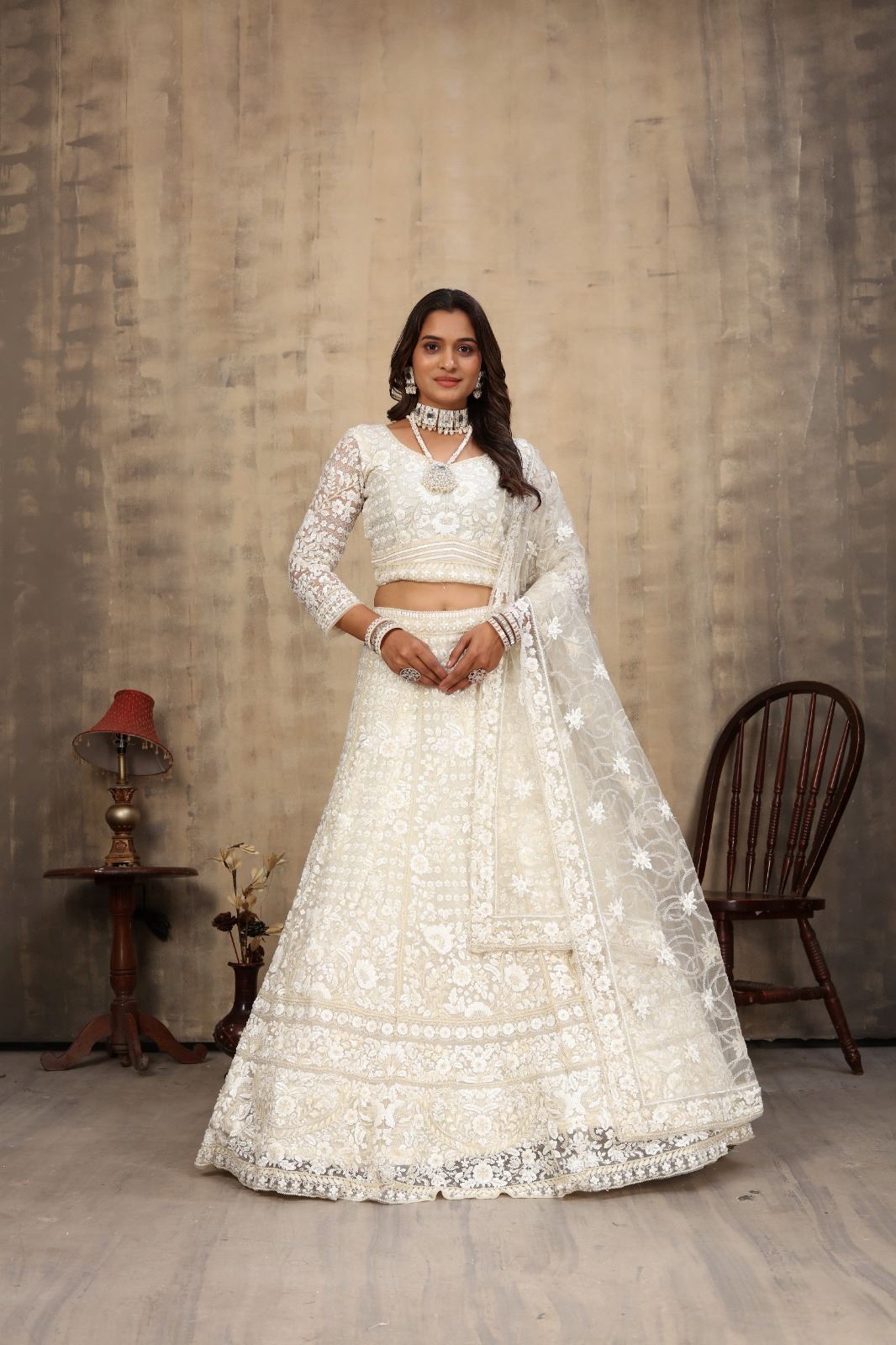 Off White Net Lehenga Choli With Embroidery Work