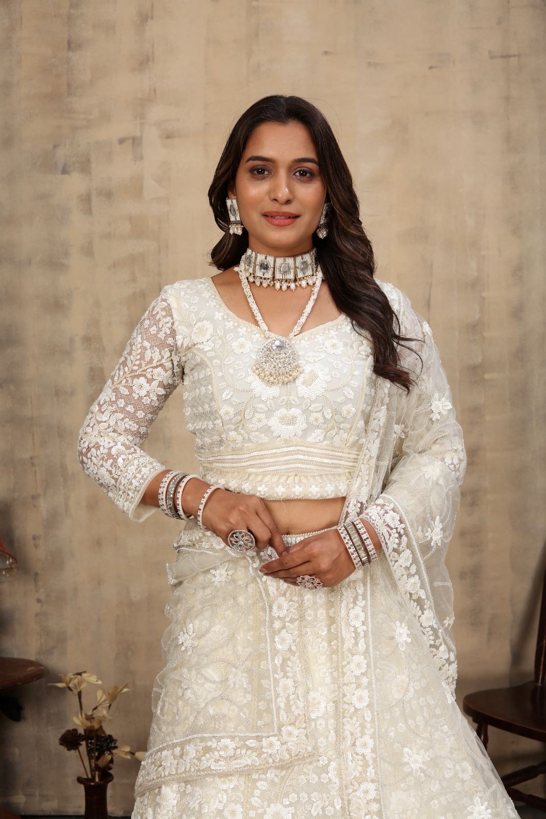 Off White Net Lehenga Choli With Embroidery Work