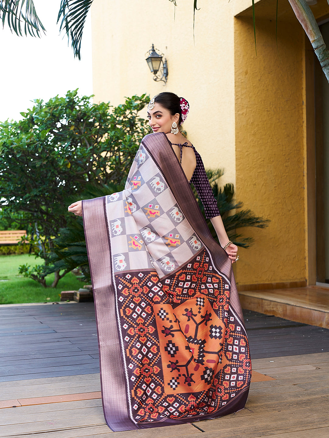 Off White Trendy Crepe Saree With Woven Zari Patta And Designer Print Work