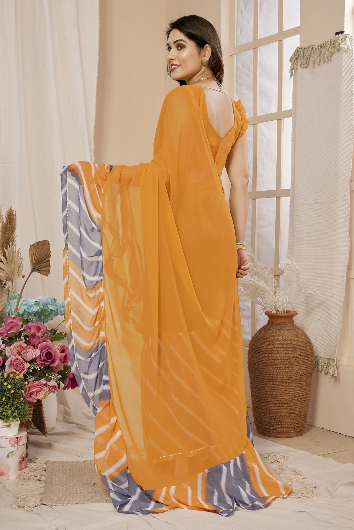 Orange Georgette Ruffle Saree