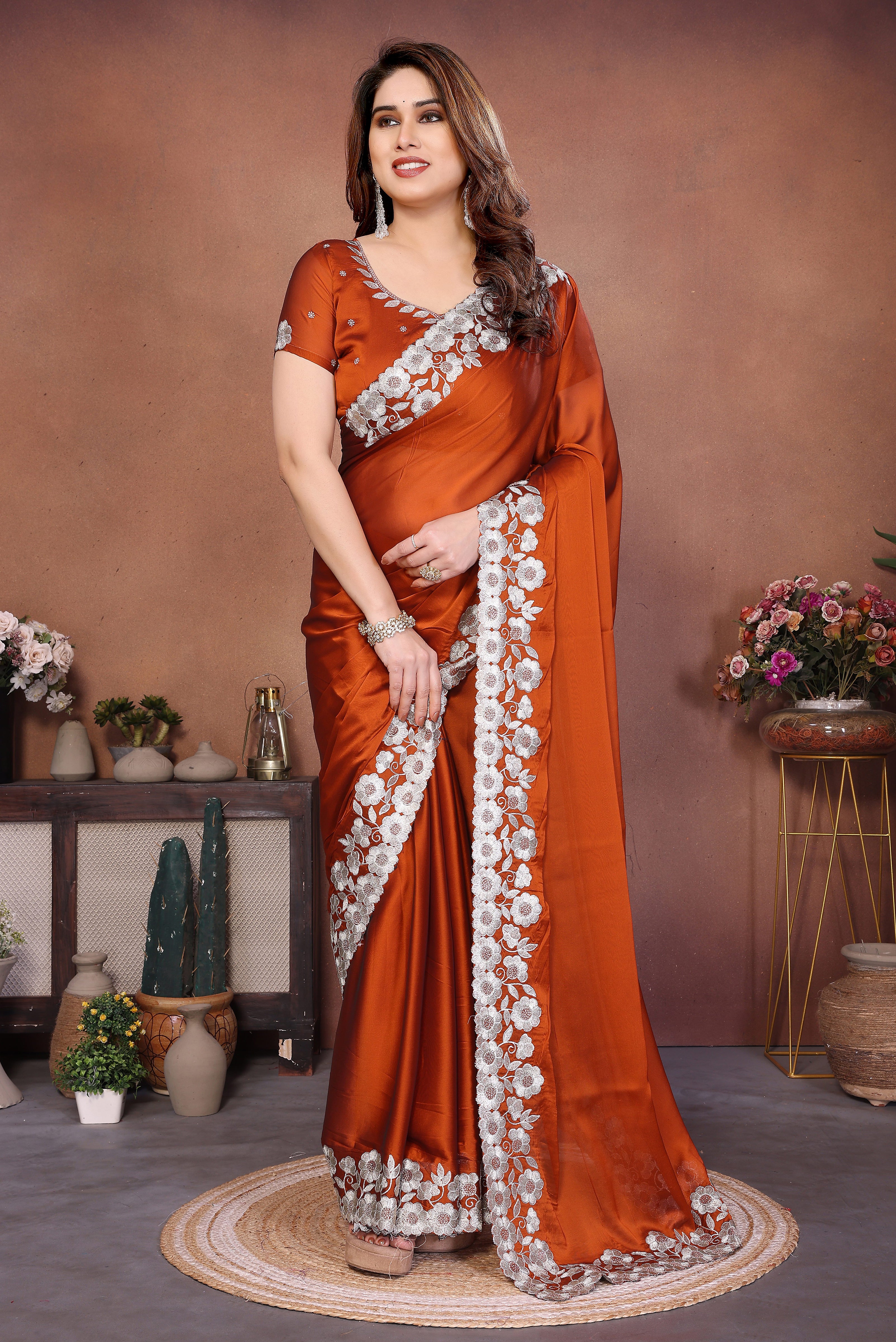 Orange Rangoli Silk Saree with Rich Embroidered Thread Work