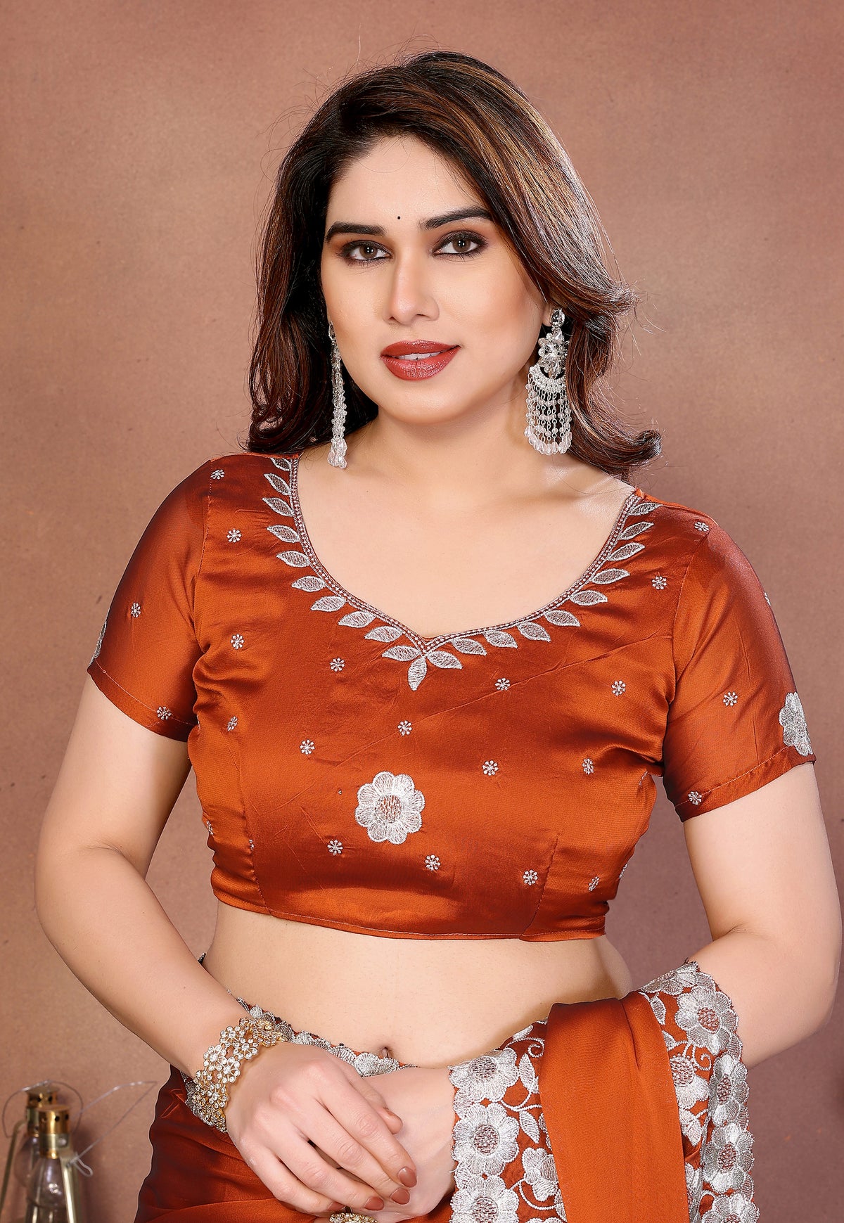 Orange Rangoli Silk Saree with Rich Embroidered Thread Work