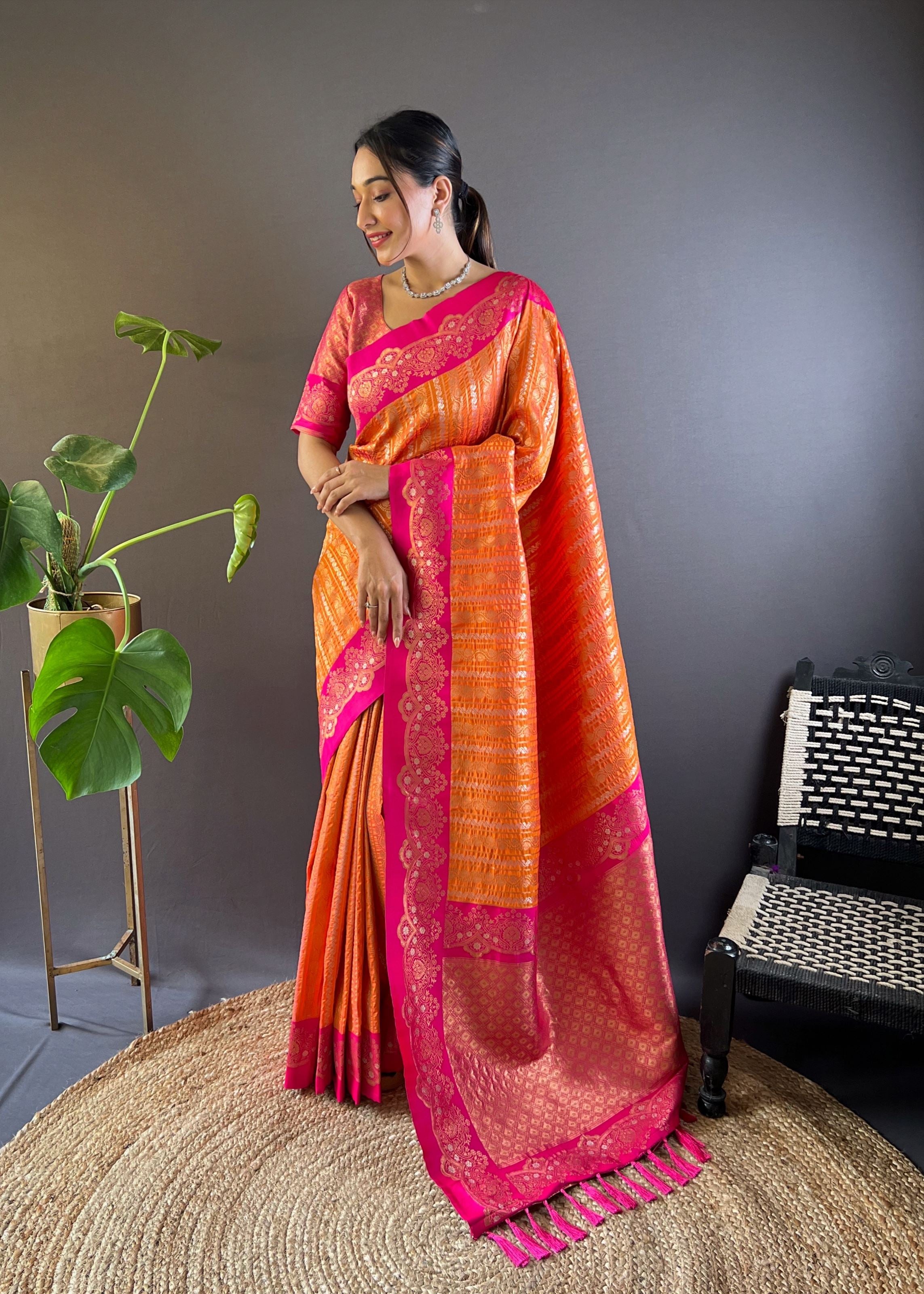 Orange Silk Blend Saree With Zari and Woven Work
