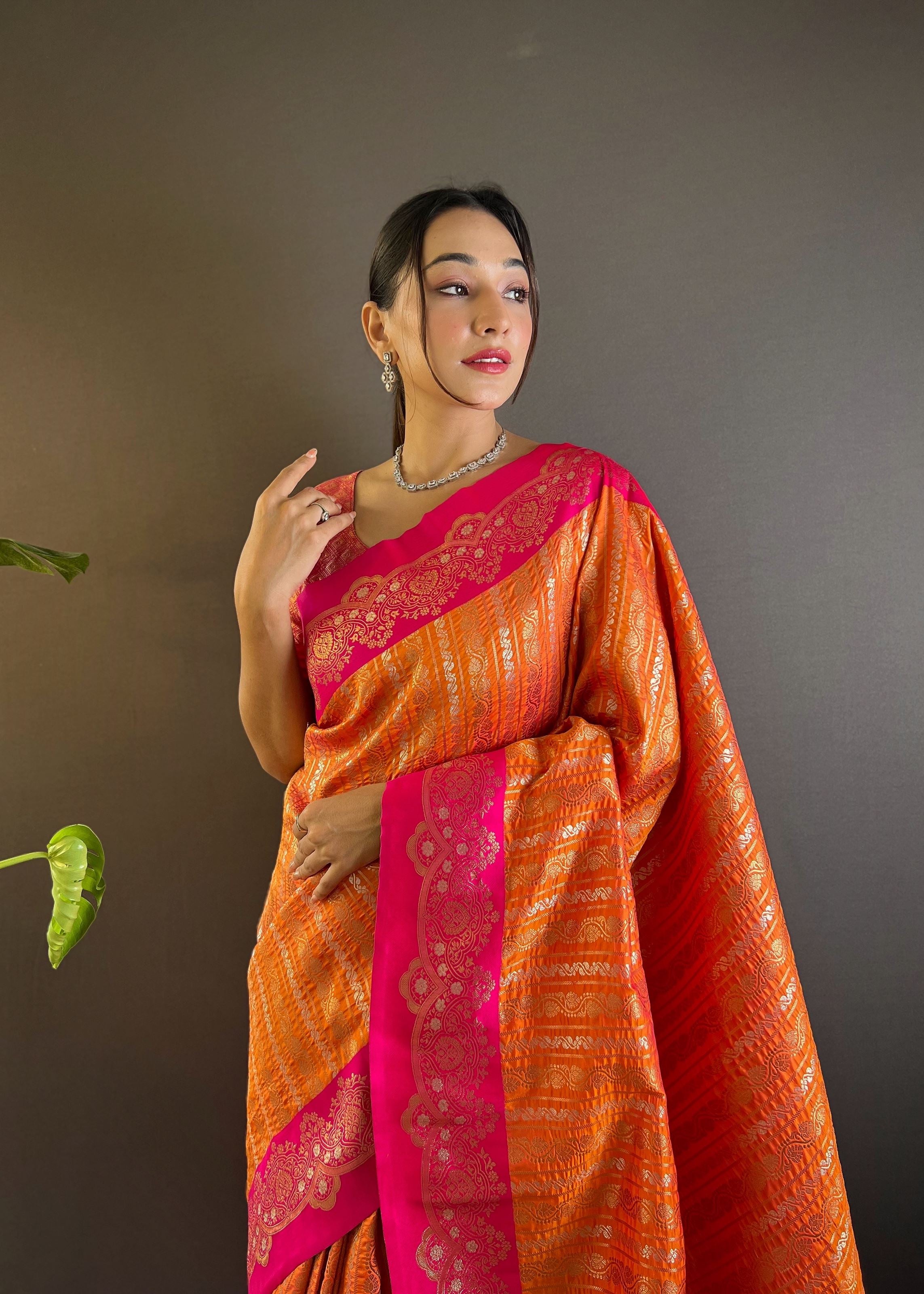 Orange Silk Blend Saree With Zari and Woven Work