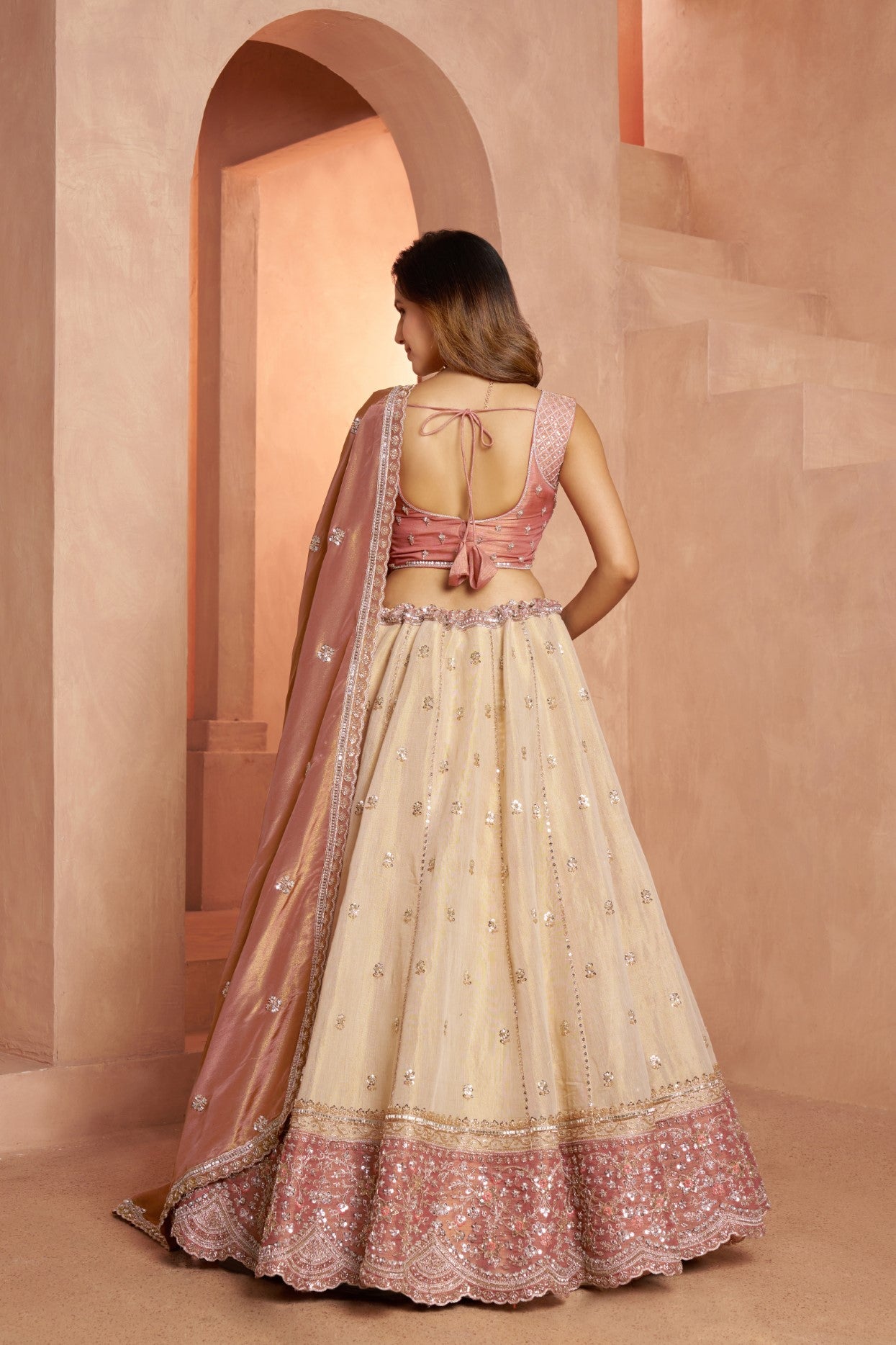 Peach Kanjivaram Tissue Luxury Embroidered Wedding Lehenga Choli
