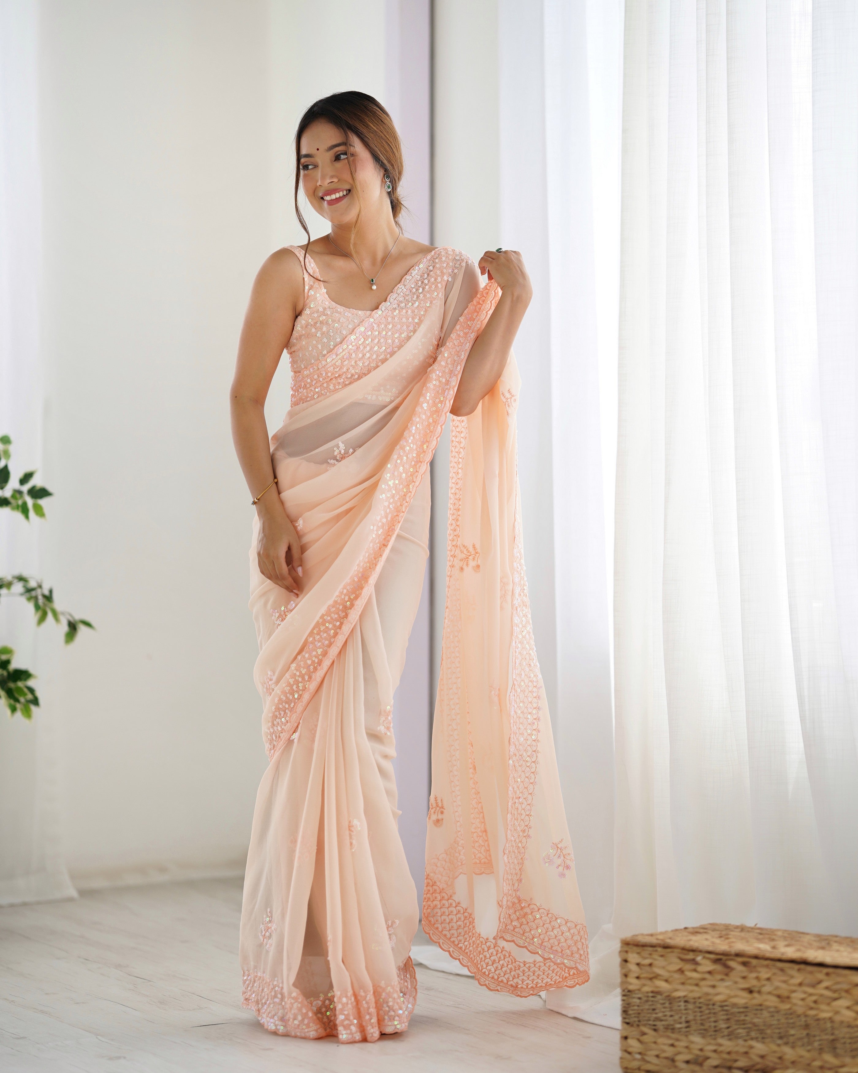Peach Smart And Sparkling Bollywood Party Style Sequins Work Saree