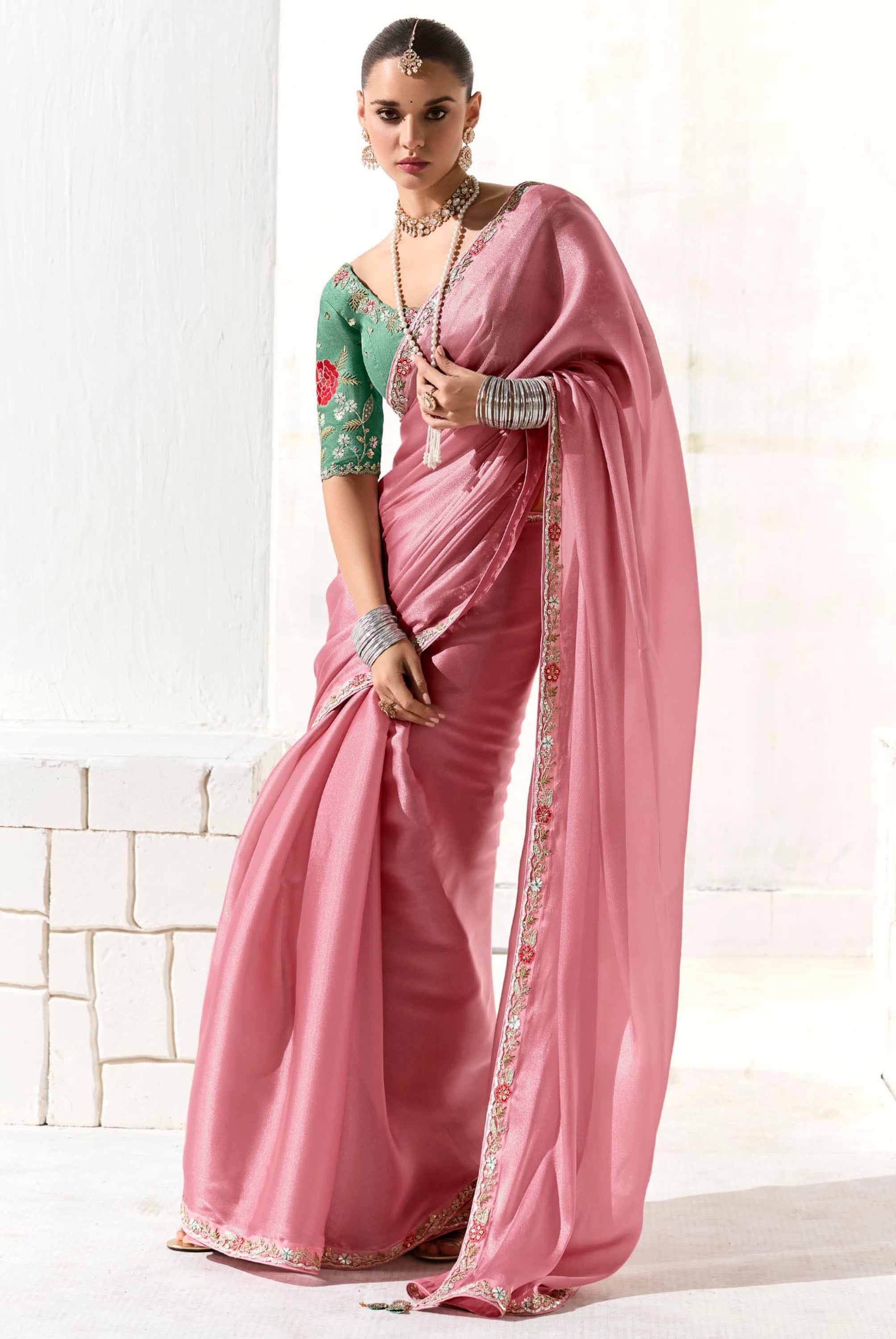 Pink Organza Tissue Saree With  Heavy Work Border With Embroidered Blouse