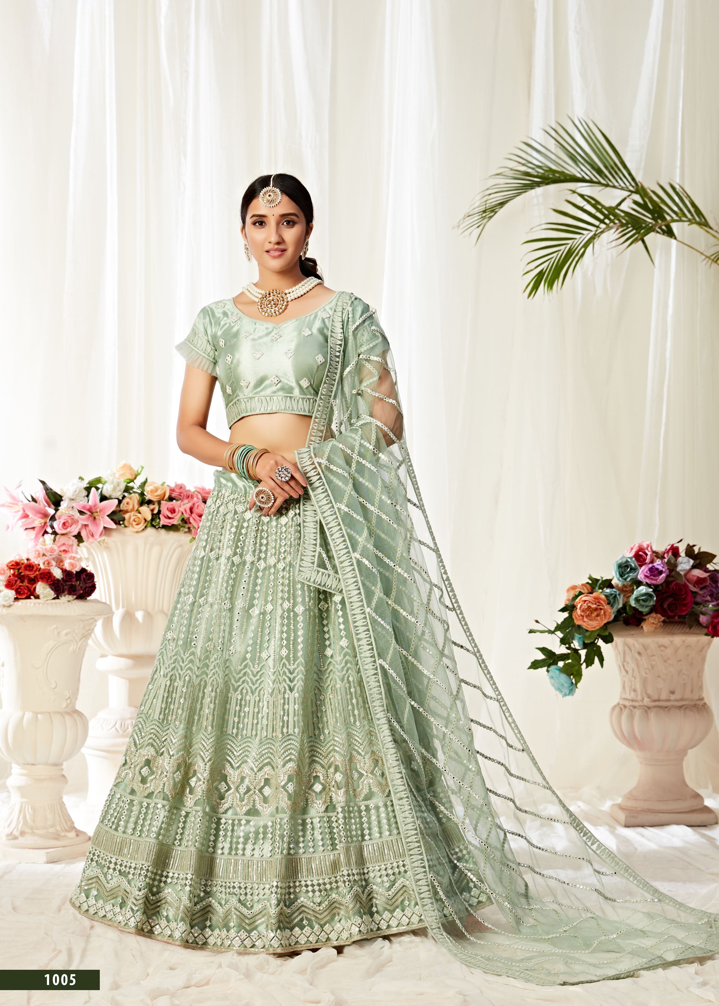 Pista Lehenga Choli With Sequins And Mirror Thread Embroidered Work