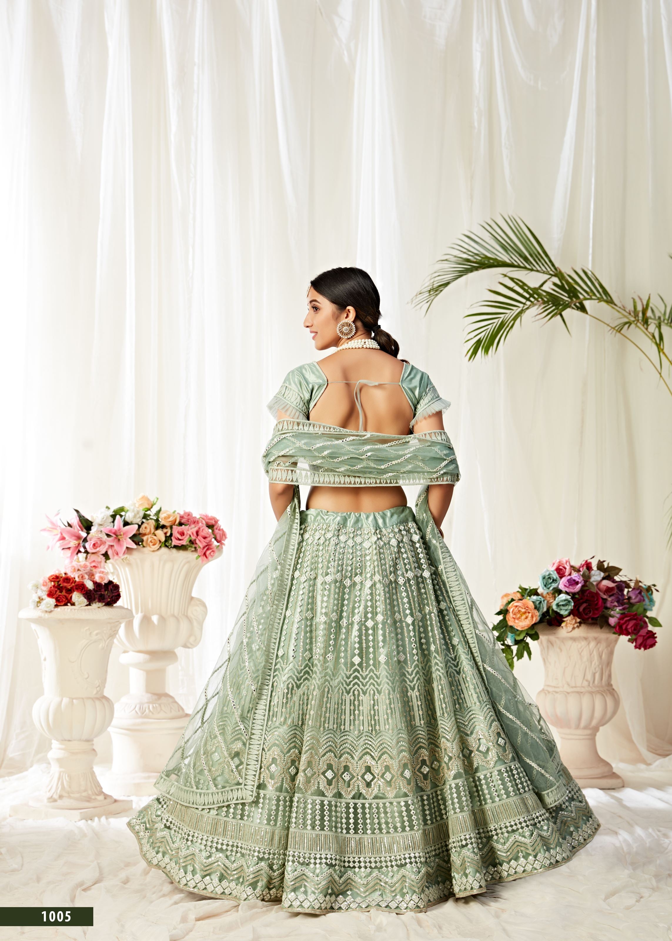 Pista Lehenga Choli With Sequins And Mirror Thread Embroidered Work