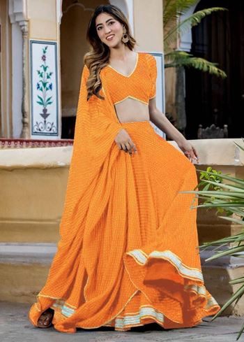 Pretty Orange Laheriya Print Georgette Wedding Lehenga Choli