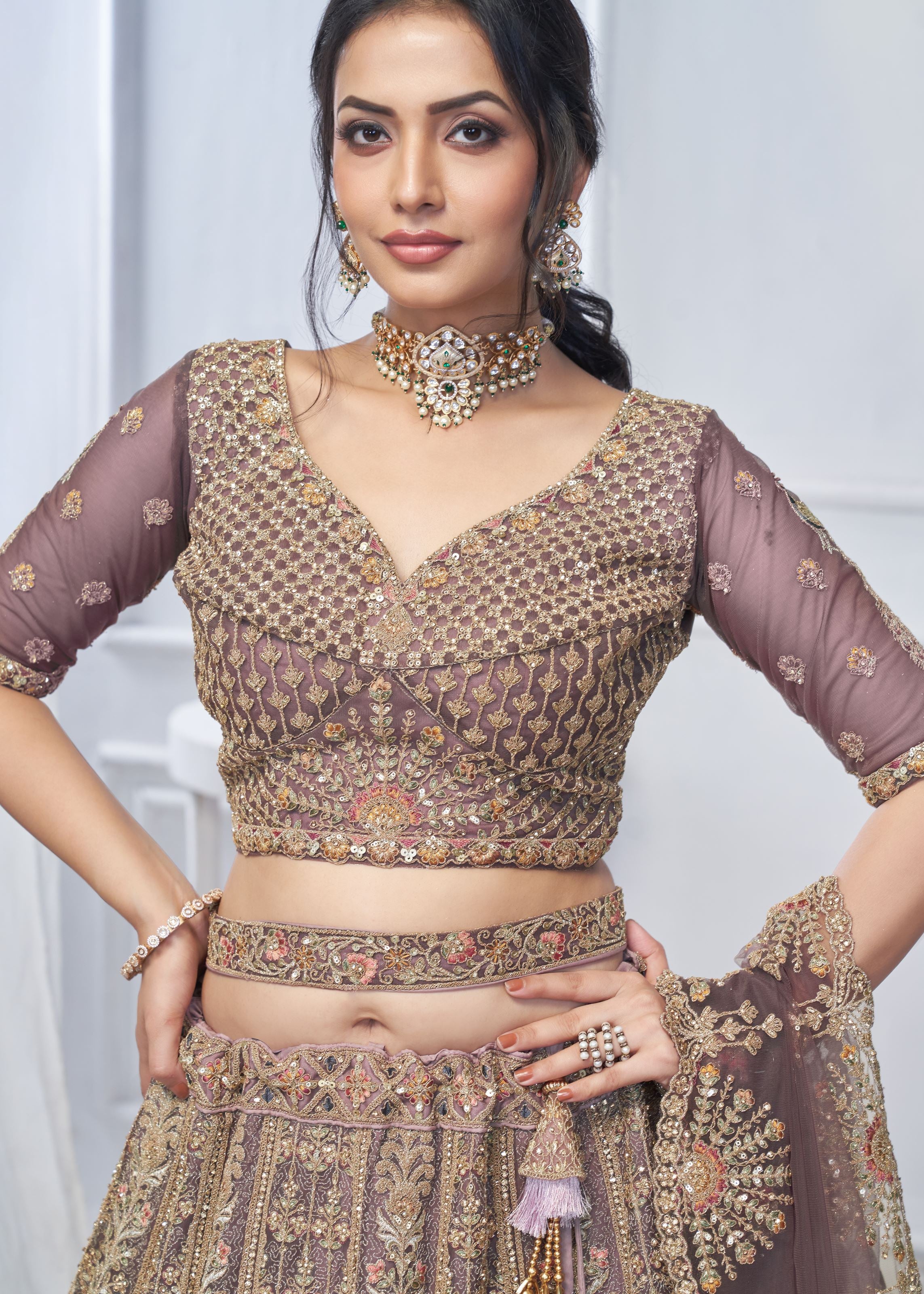 Purple Soft Net Lehenga Choli With Paisley And Peacock Motifs & Heavy Embroidery