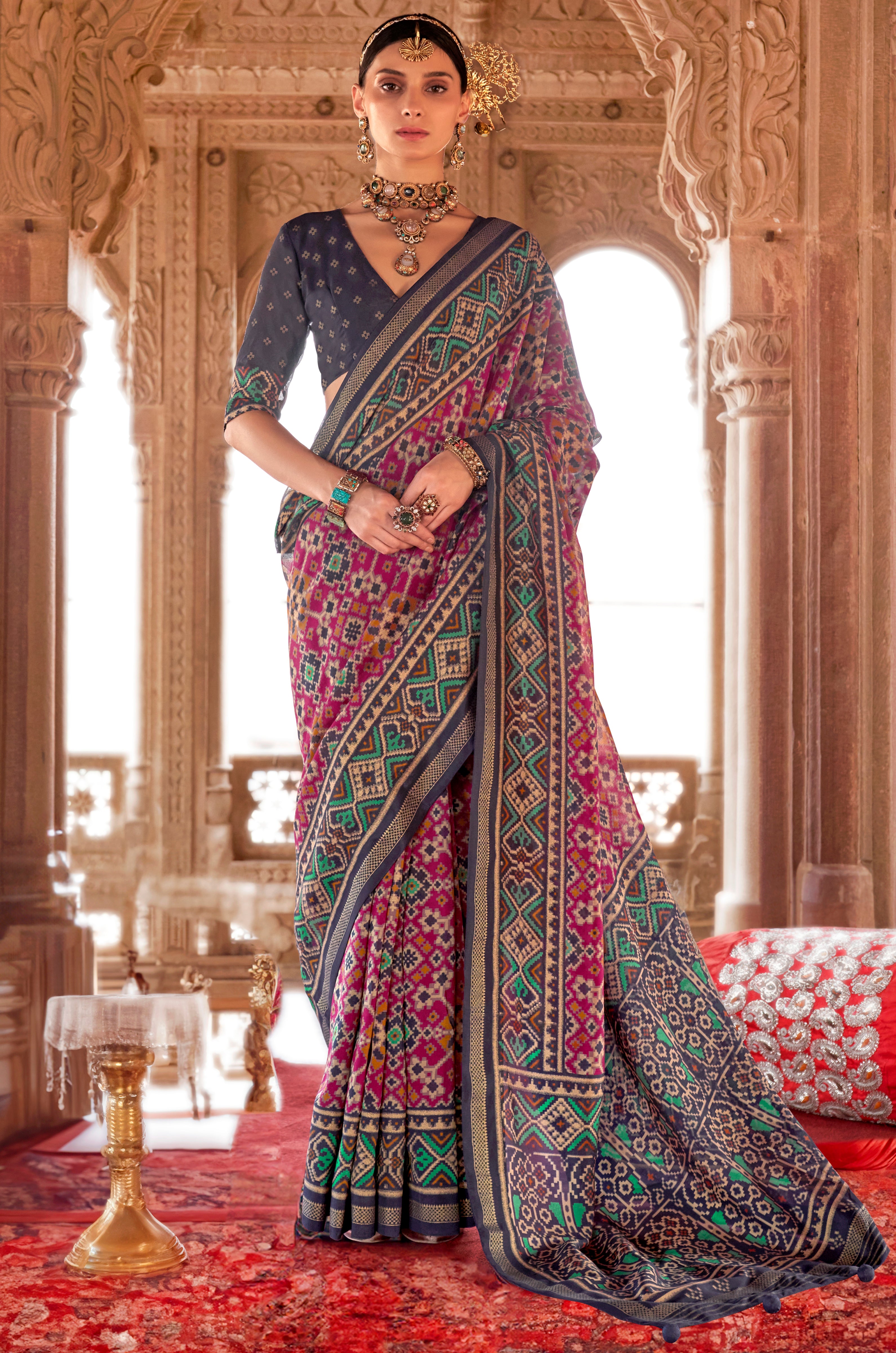Rani Pink Super Georgette Saree With  Patola Print
