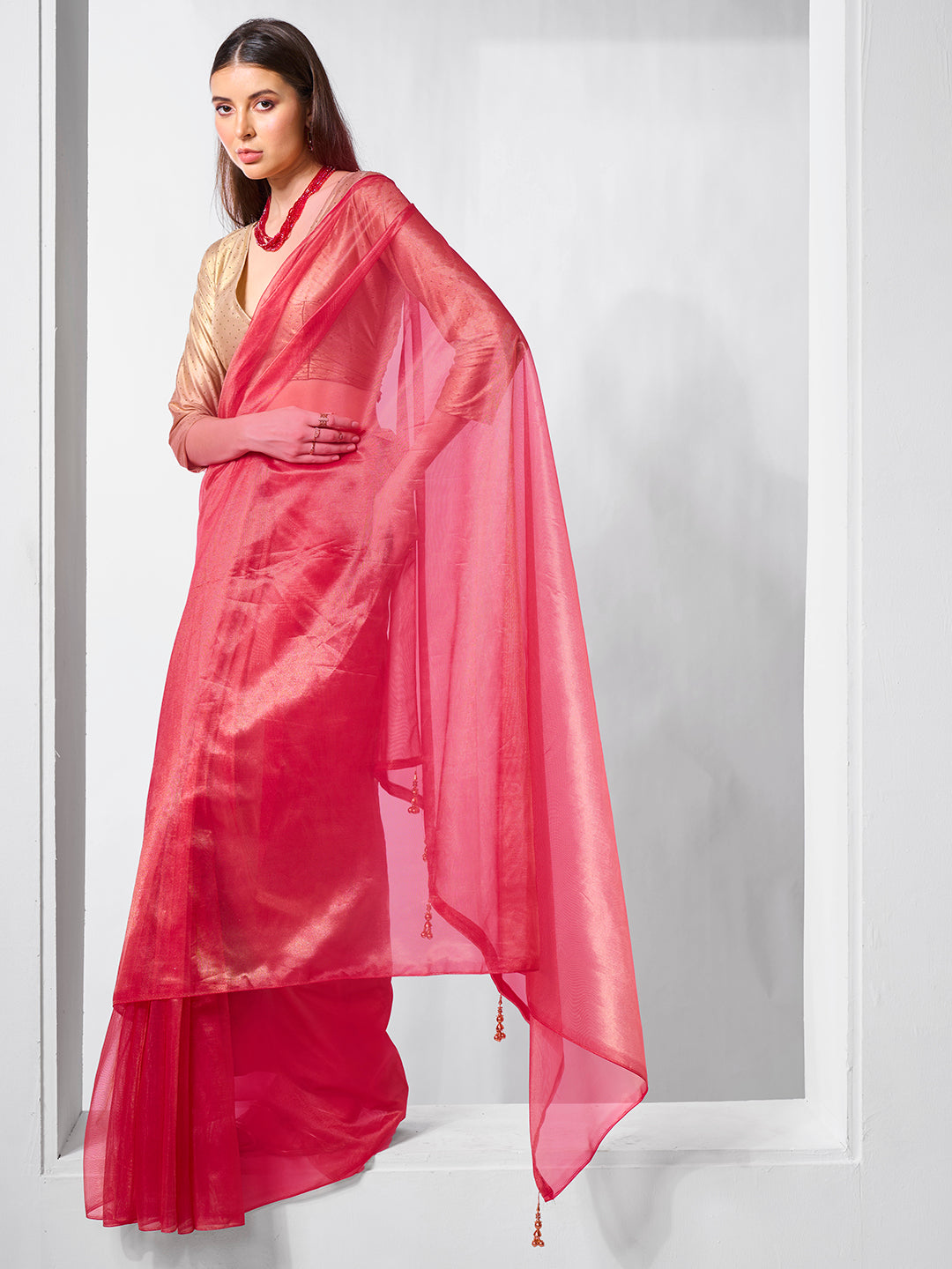 Red Gold Tissue Net Solid Texture Saree With Graceful Gold Cotted