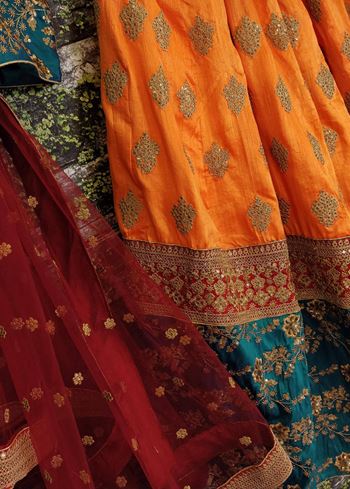 Sabyasachi Teal Green-Yellow Bridal Lehenga Choli With Dupatta