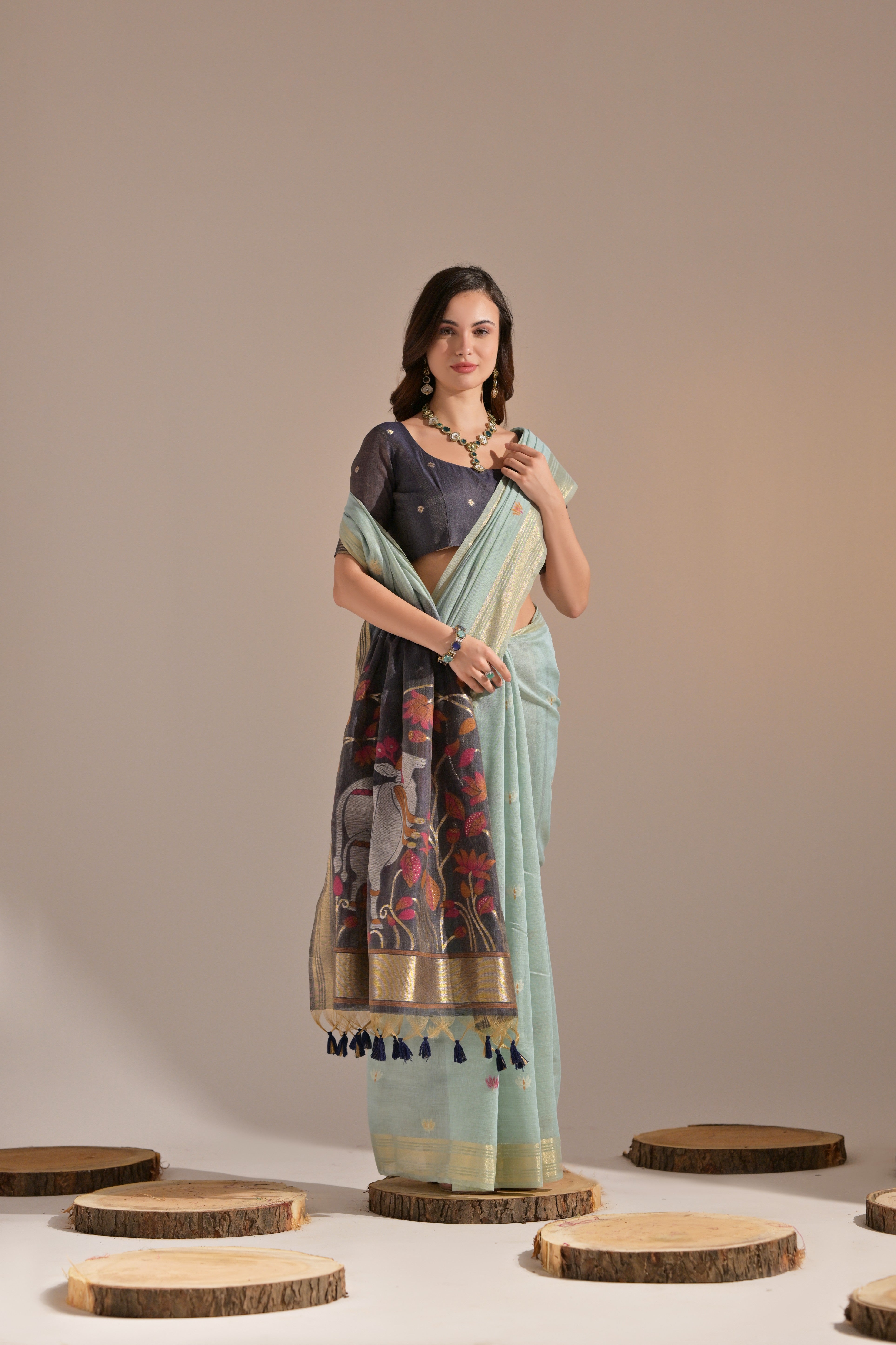 Sea-Green Muga Cotton Saree with Cow Design and Butti Weaves