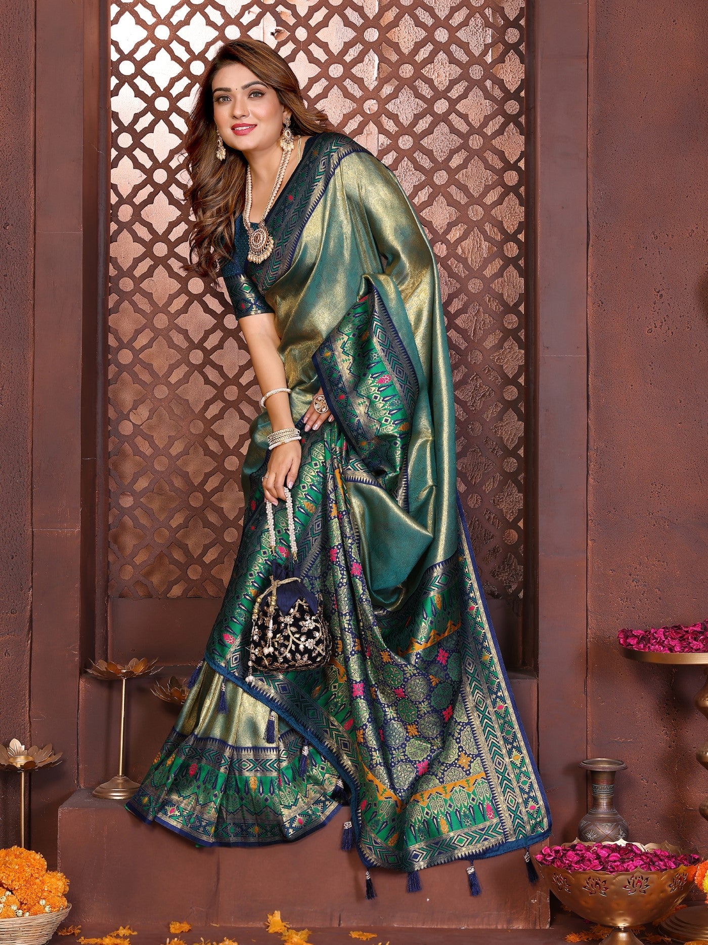 Sea Green Tissue Silk Saree With Traditional Weaving