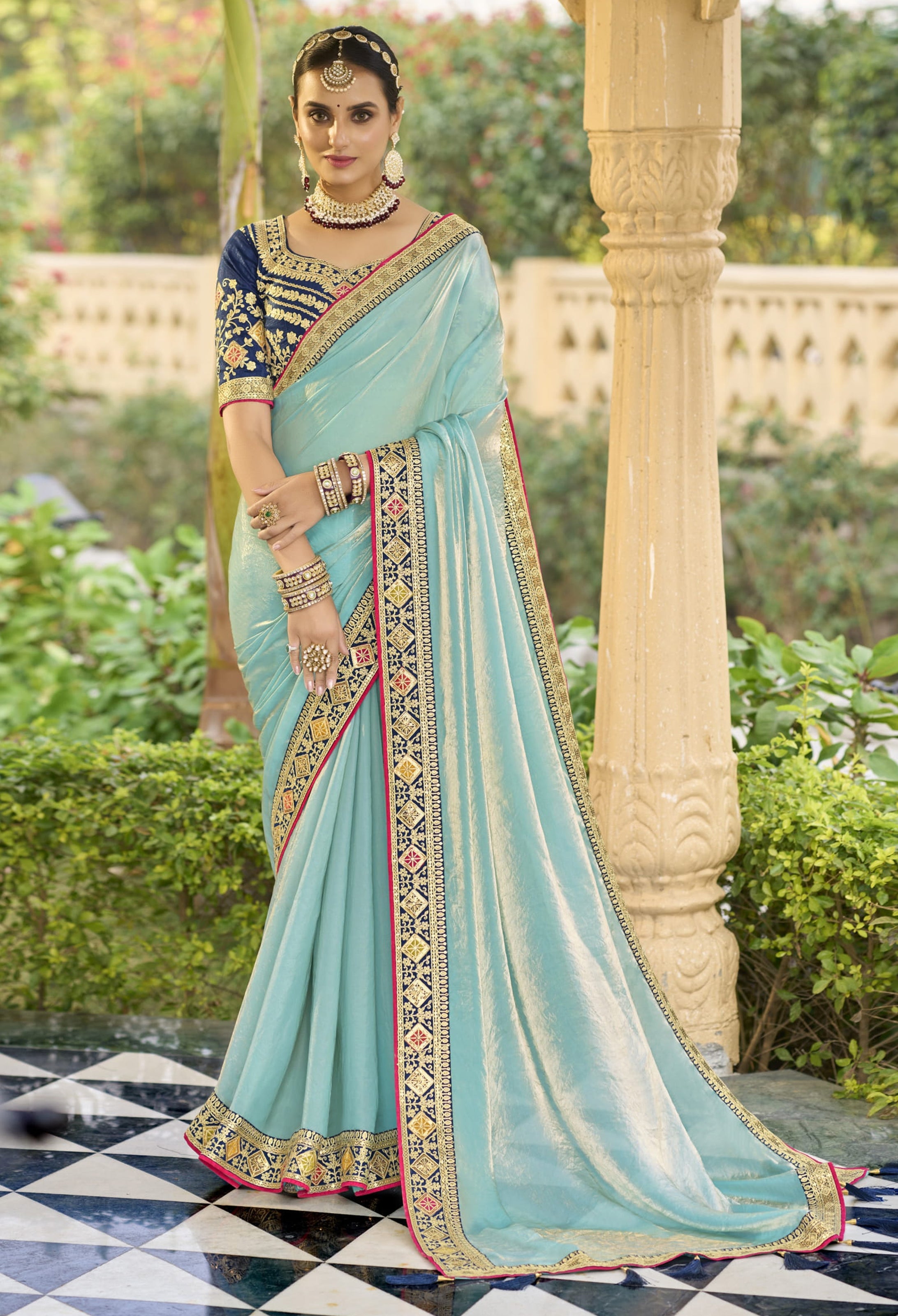 Sky Blue Georgette Plain Saree With Embroidered Lace Border