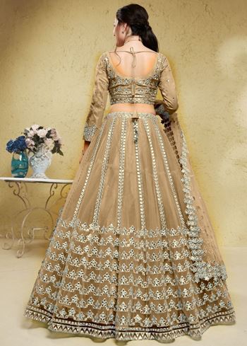 Stunning Beige Foil Work Net Wedding Lehenga Choli With Dupatta
