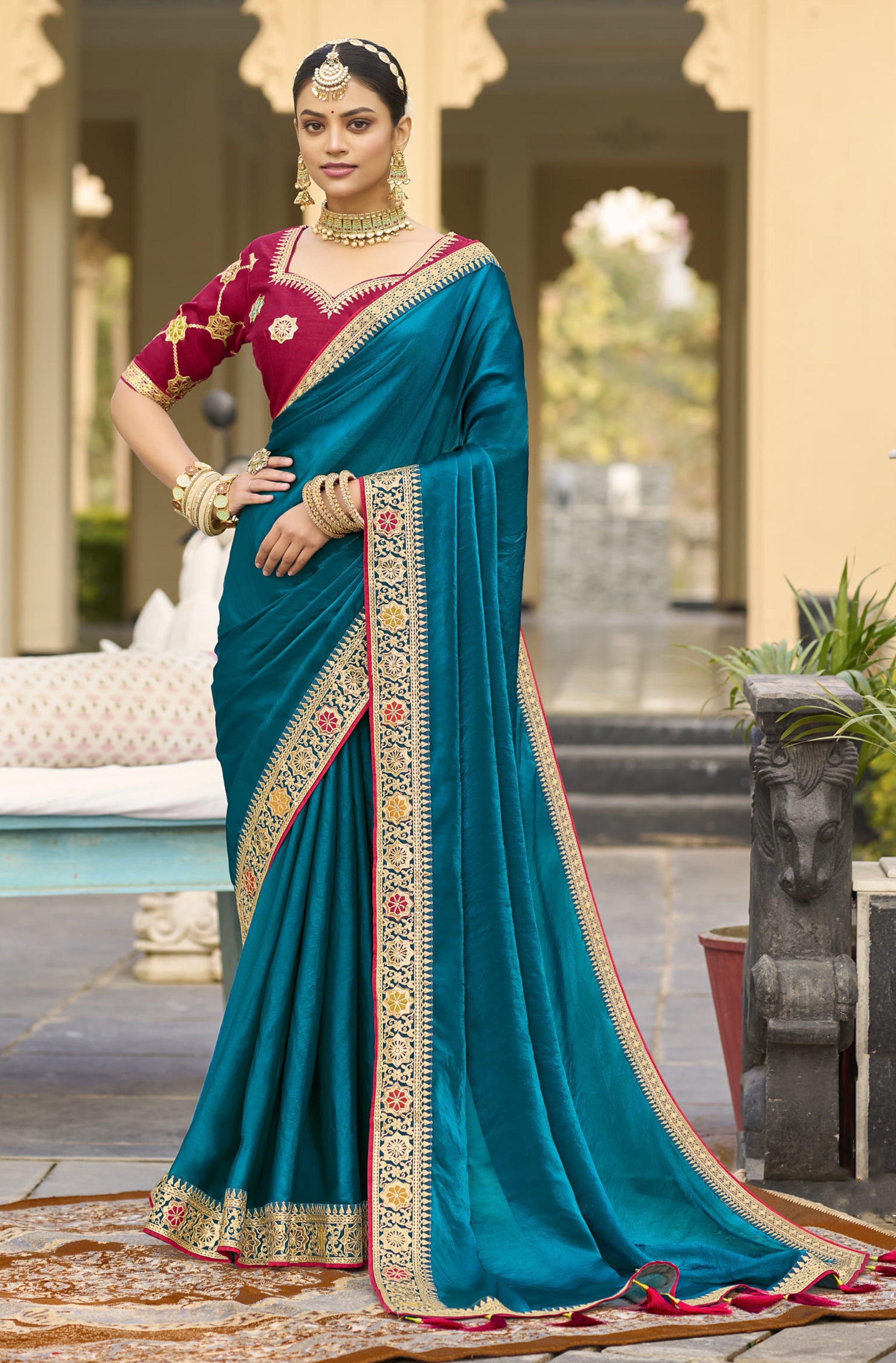 Teal Blue Georgette Plain Saree With Embroidered Lace Border