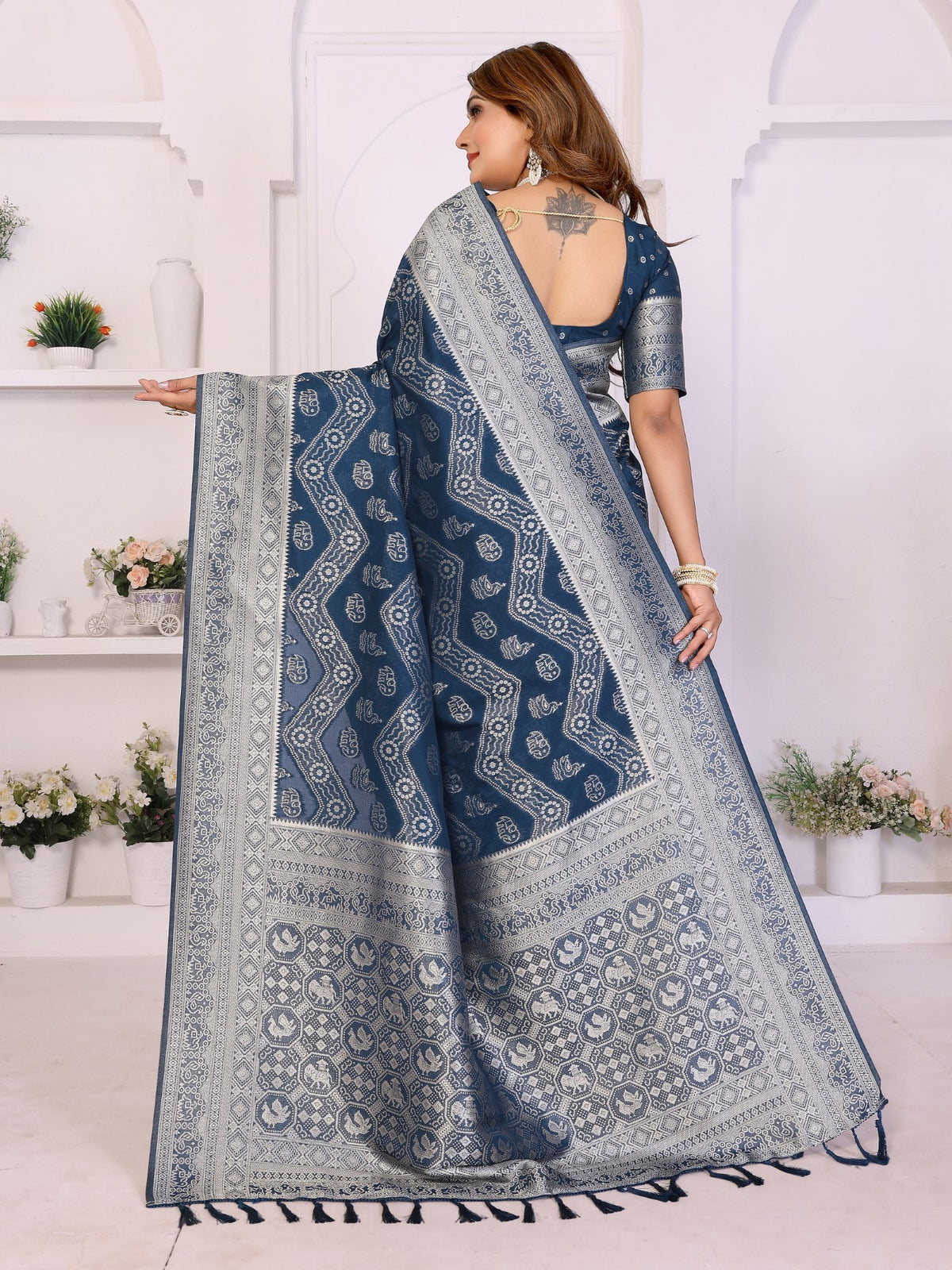 Teal Blue Georgette Silk Saree With Leheriya And Elegant Zari Weaving