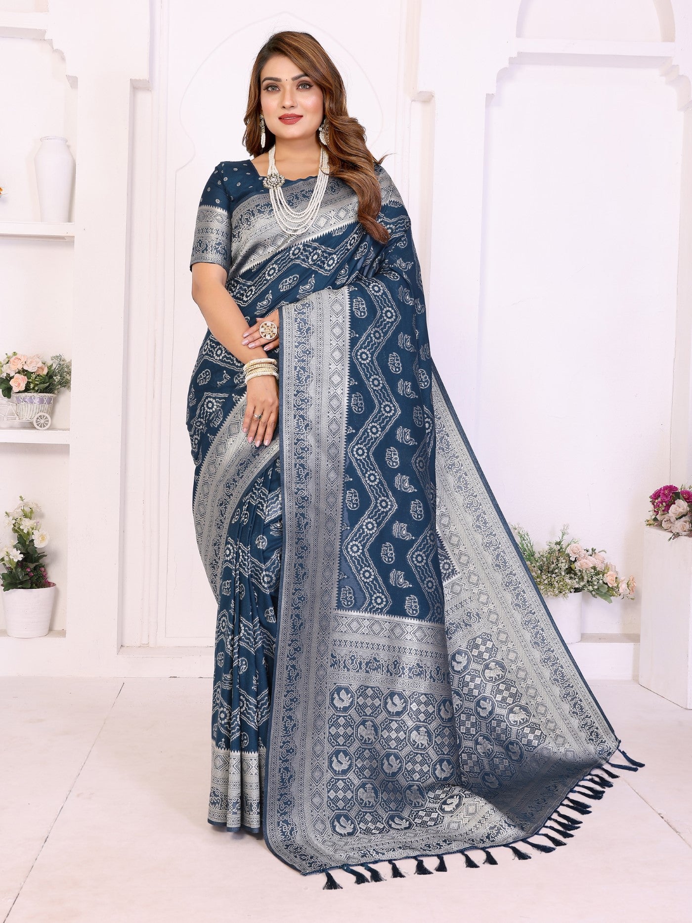 Teal Blue Georgette Silk Saree With Leheriya And Elegant Zari Weaving