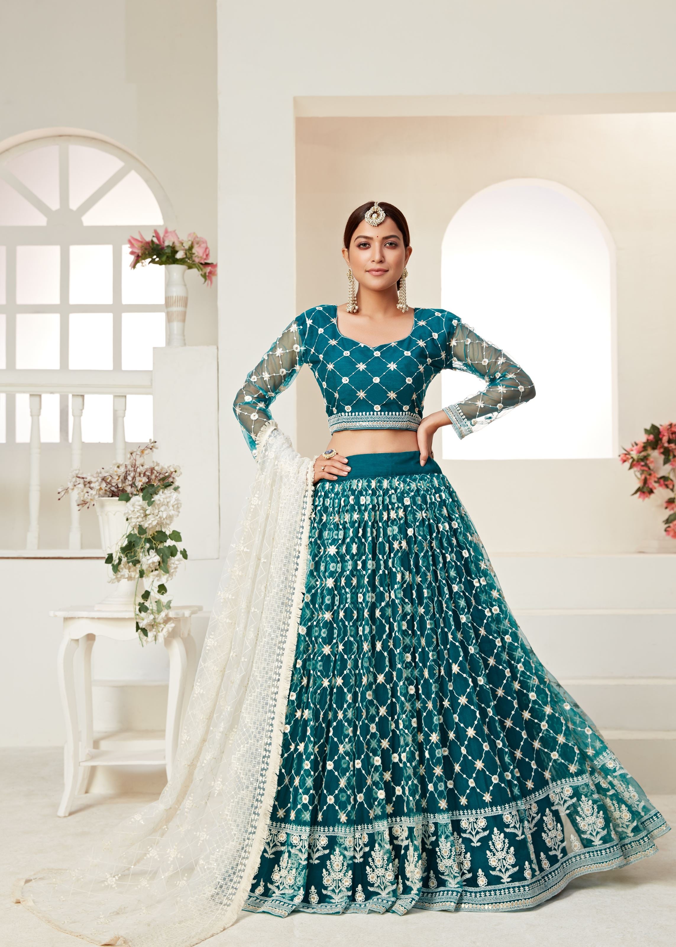 Teal Green Lehenga Choli And Dupatta With Multi Net And Sequence Embroidered Thread Work