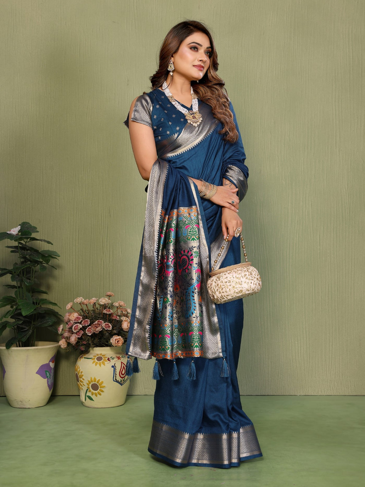 Teal Silk Saree With Elegant Weaving