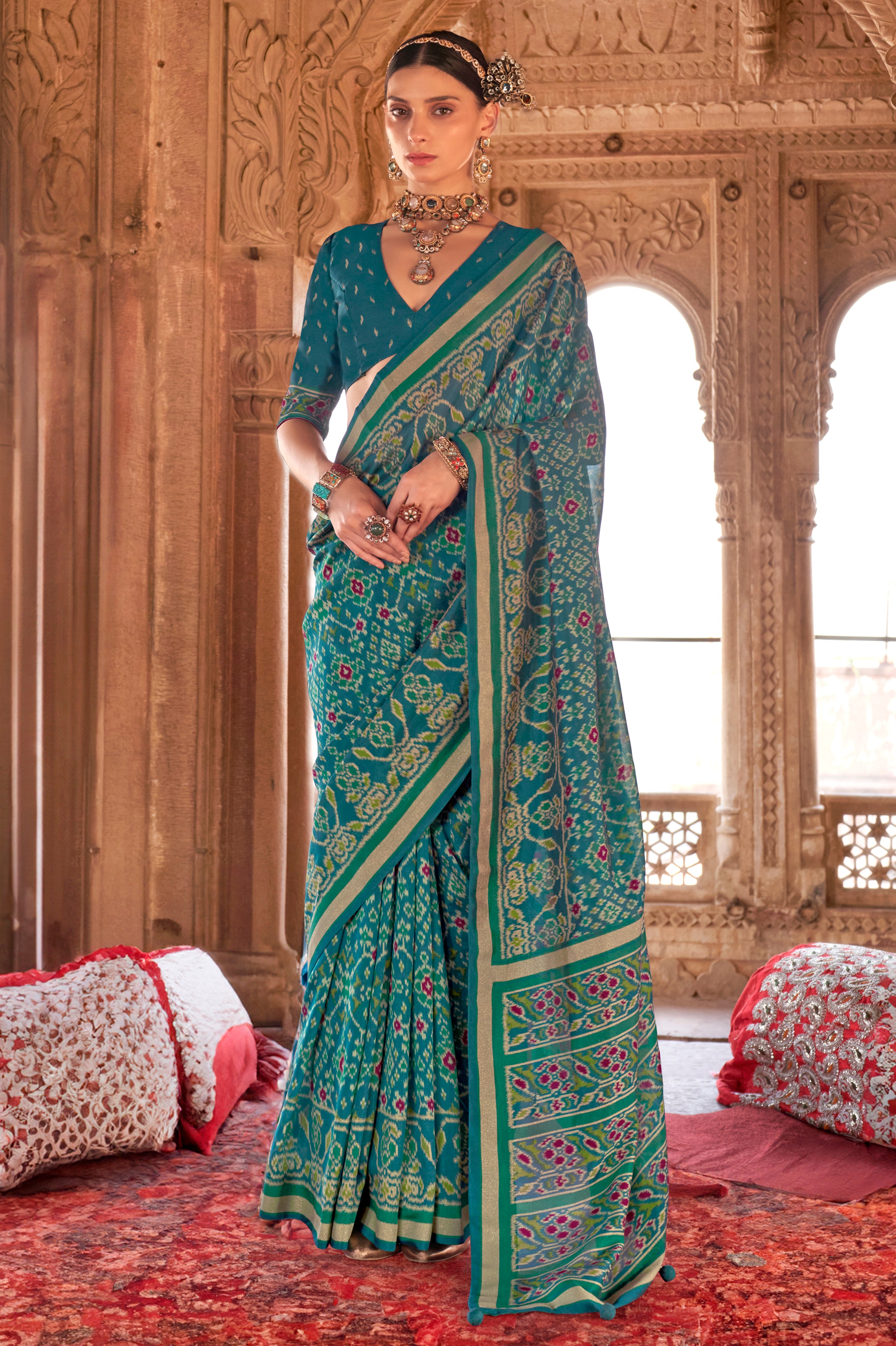 Teal Super Georgette Saree With  Patola Print