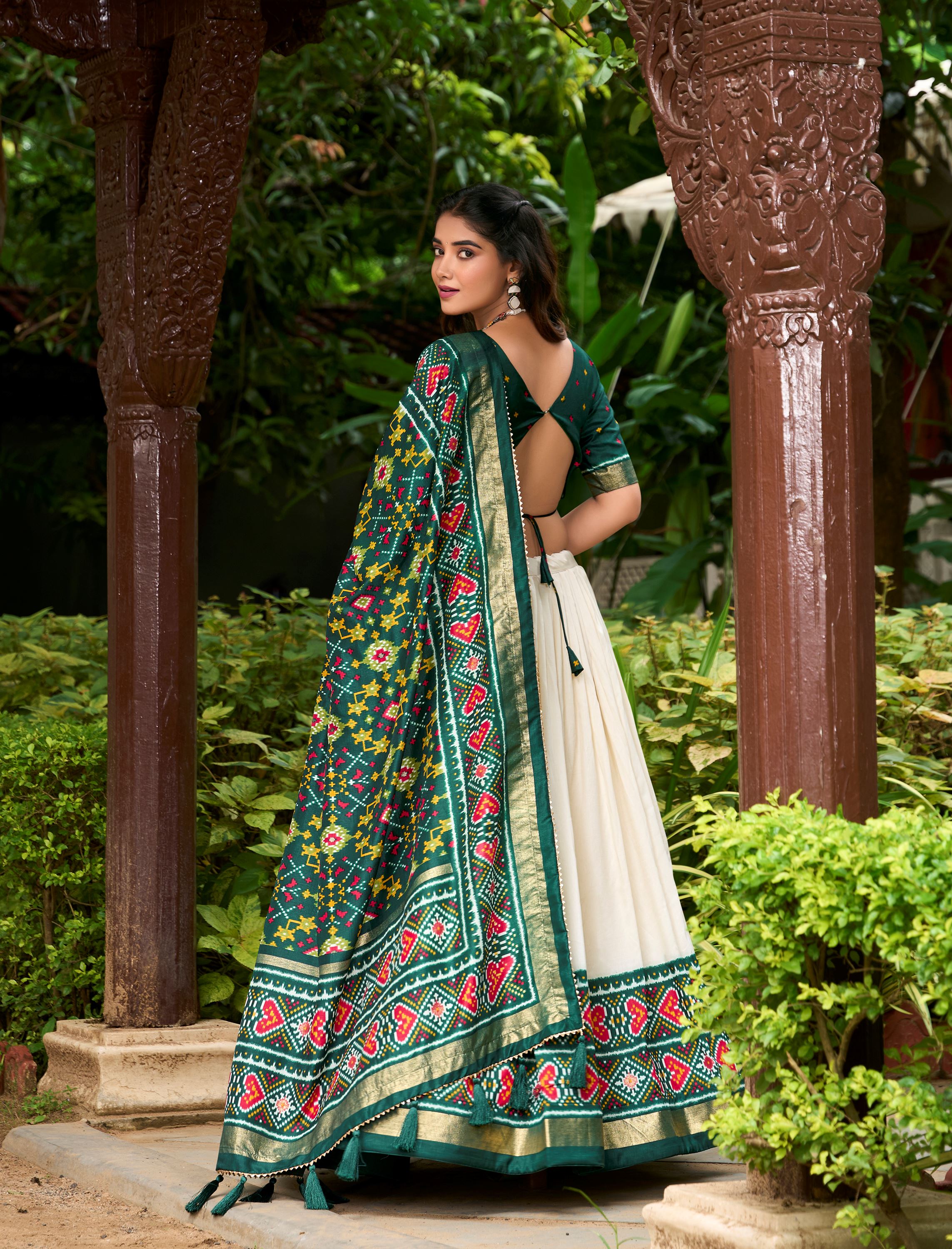 Tradition in Bloom Green  Tussar Silk Lehenga with Royal Patola Print