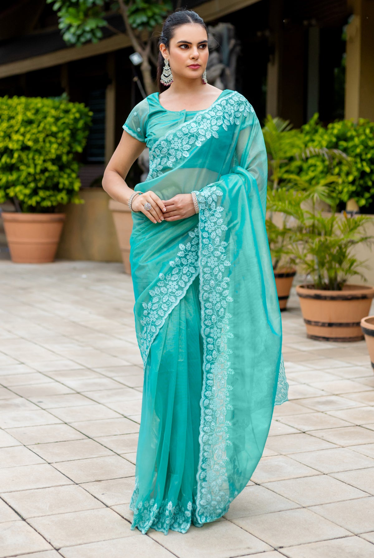 Turquoise Gold-Infused Twill Saree with Zari Sequins Cut Work