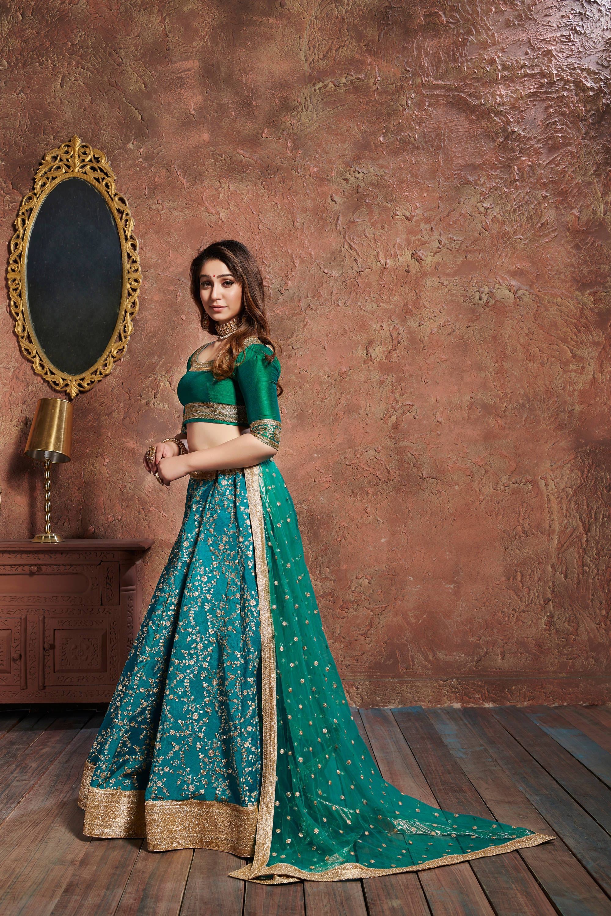 Turquoise Lehenga Choli With Zari, Sequins And Dori Embroidery