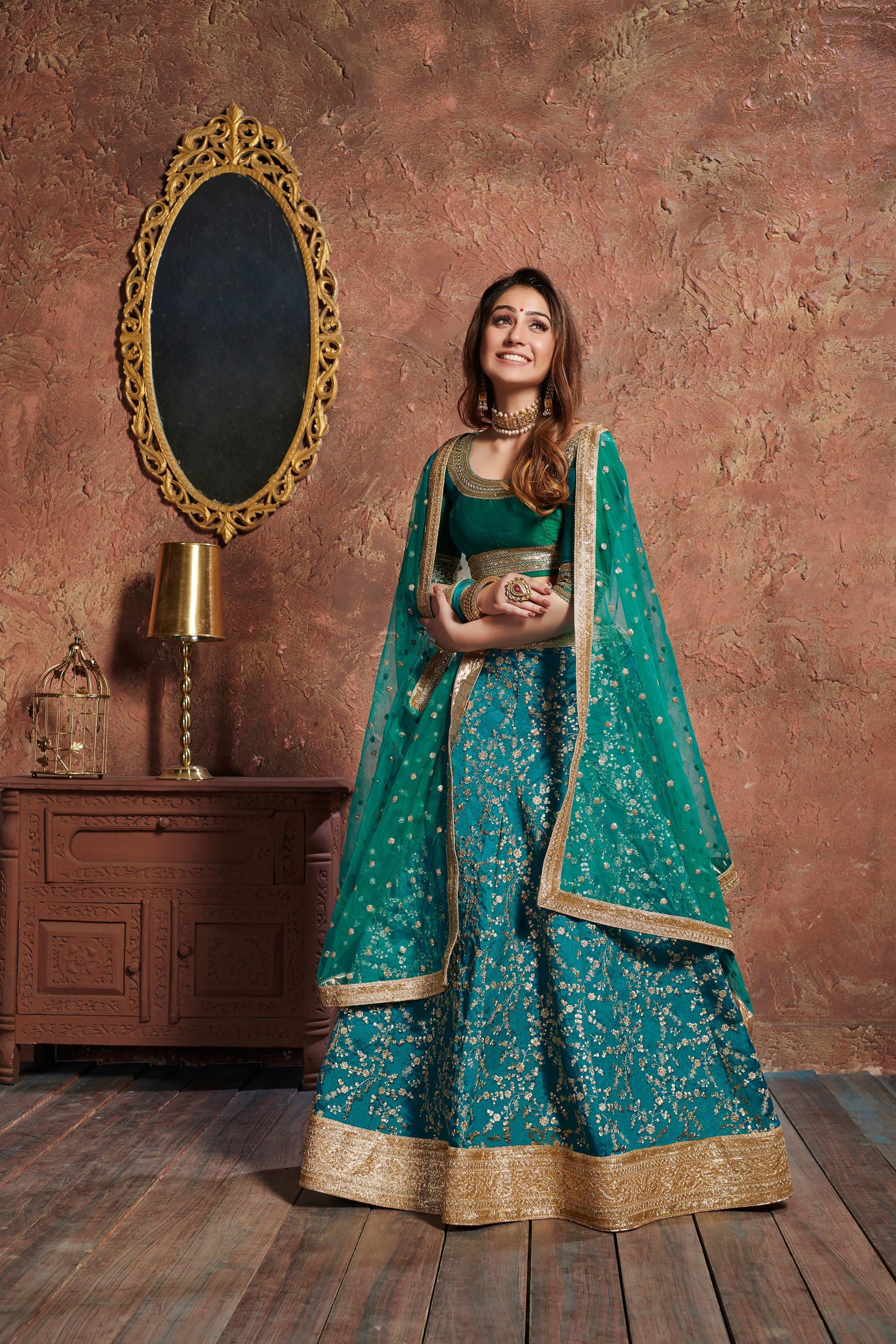 Turquoise Lehenga Choli With Zari, Sequins And Dori Embroidery