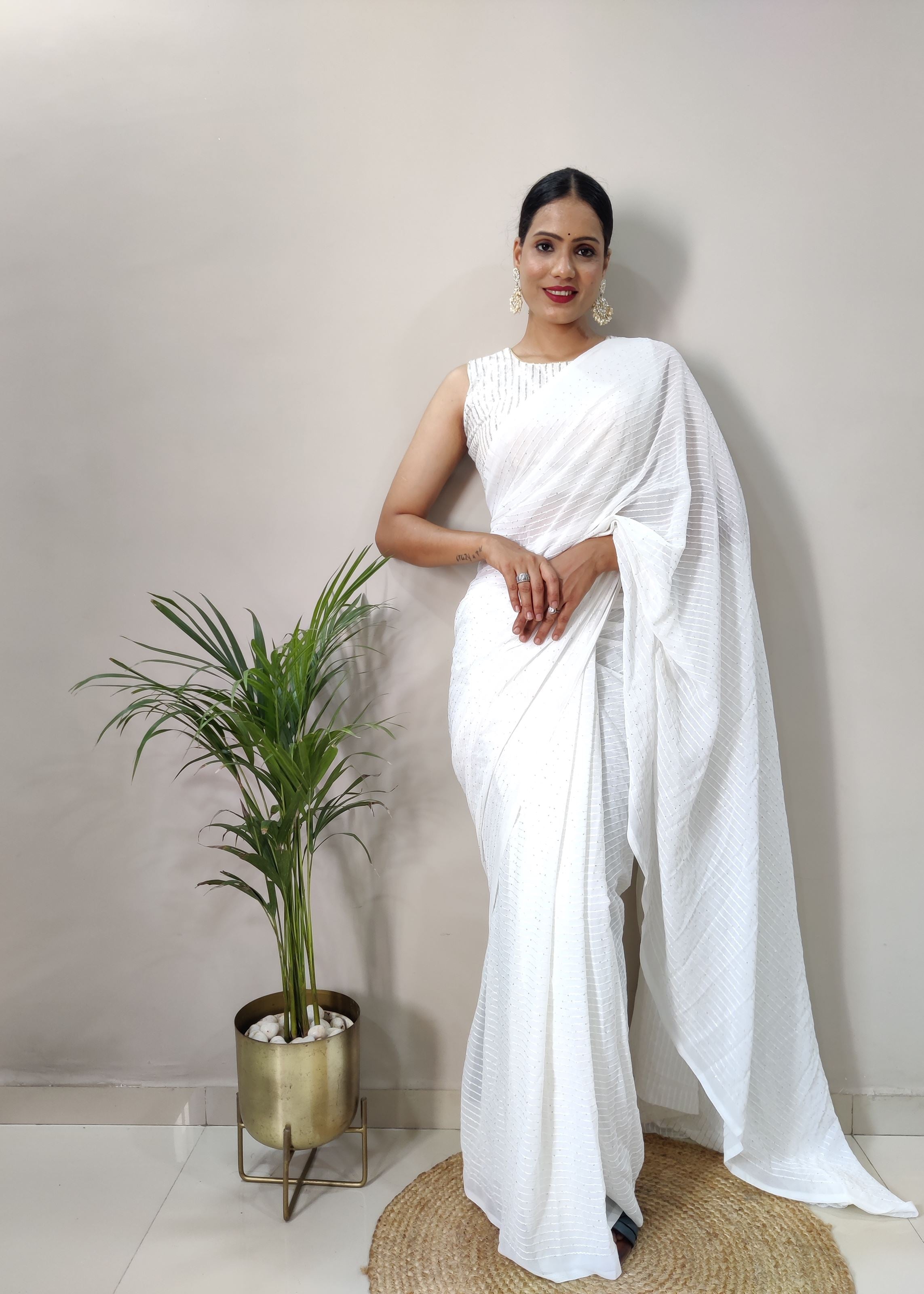 White Colour Georgette Fabric Heavy Work Saree