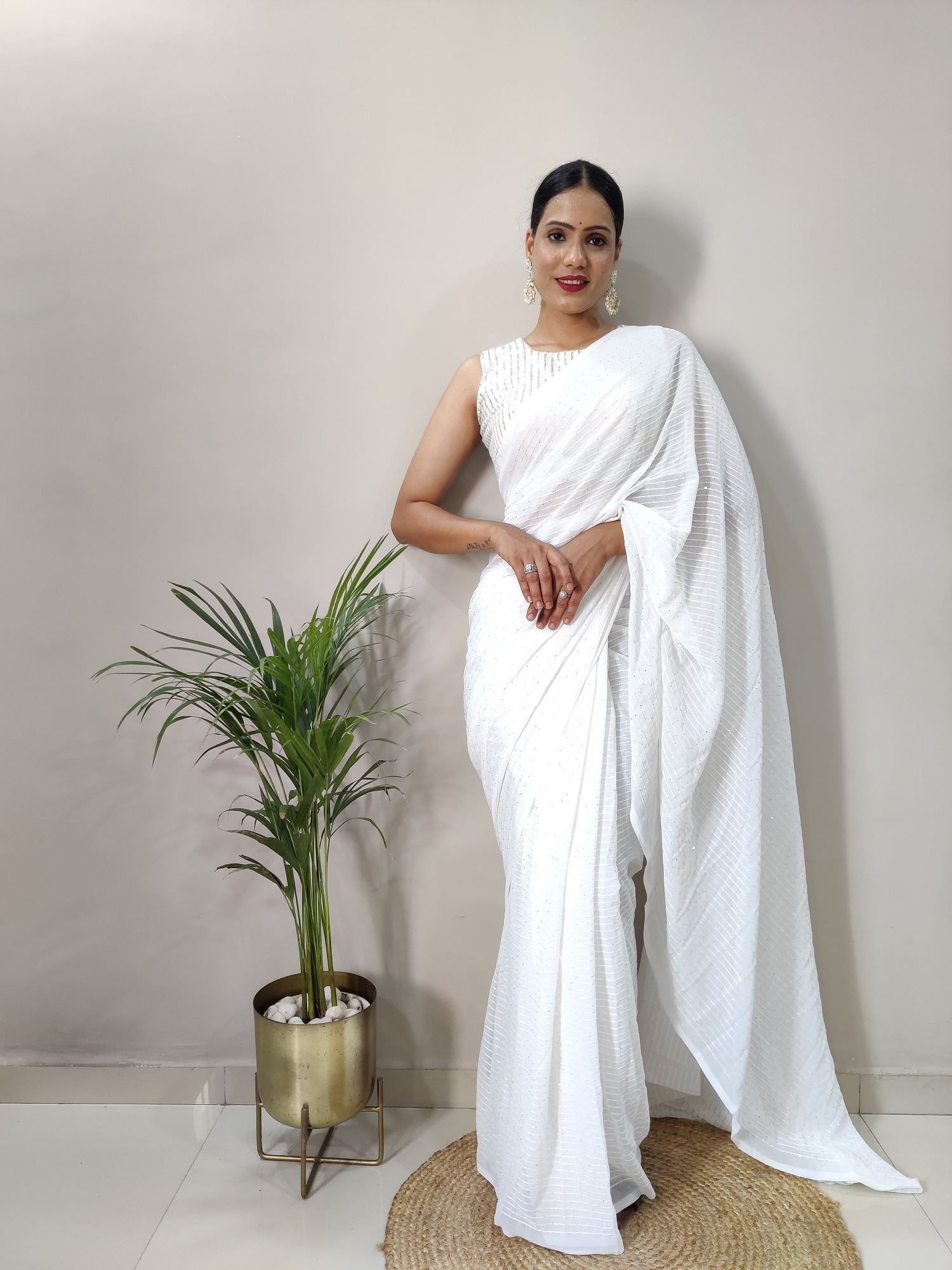 White Colour Georgette Fabric Heavy Work Saree