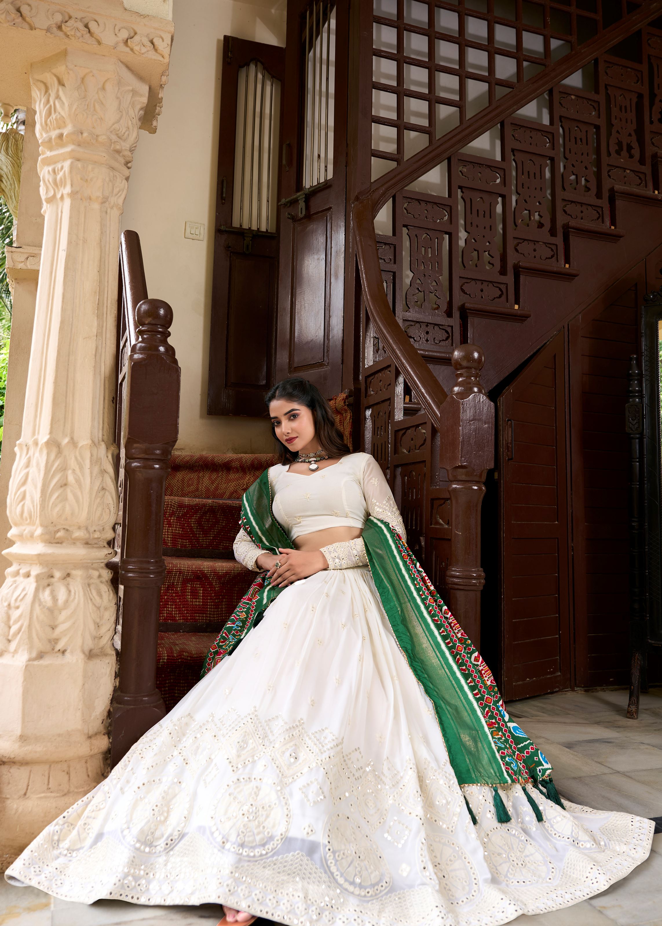 White Elegance Lucknowi Embroidered Lehenga with Subtle Mirror Highlights