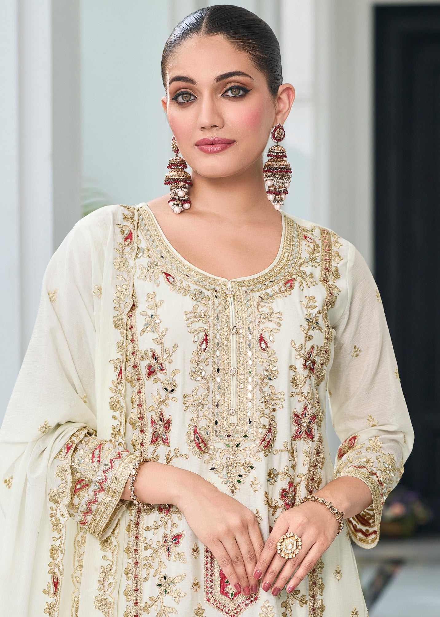 White Heavy Designer Suit With Heavy Embroidery Work
