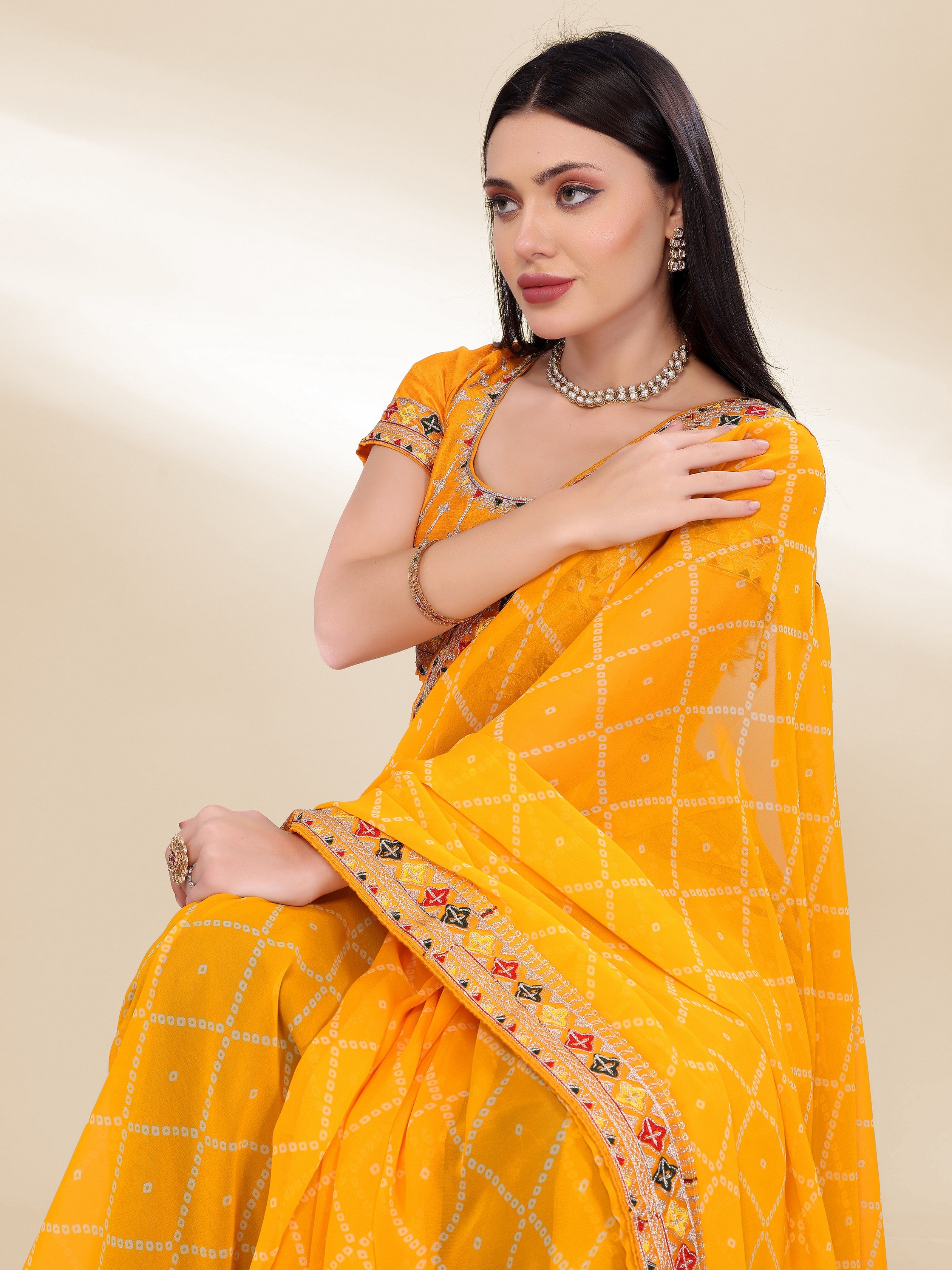 Yellow Georgette Bandhej Printed Saree With Graceful Embroidery Work