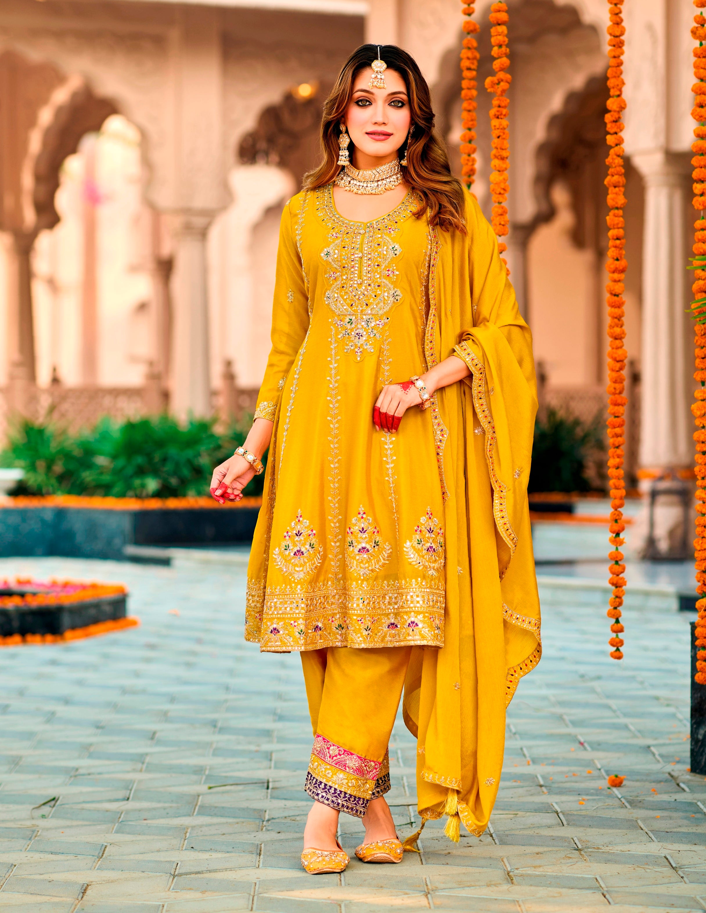 Yellow Heavy Designer Suit With Heavy Embroidery Work
