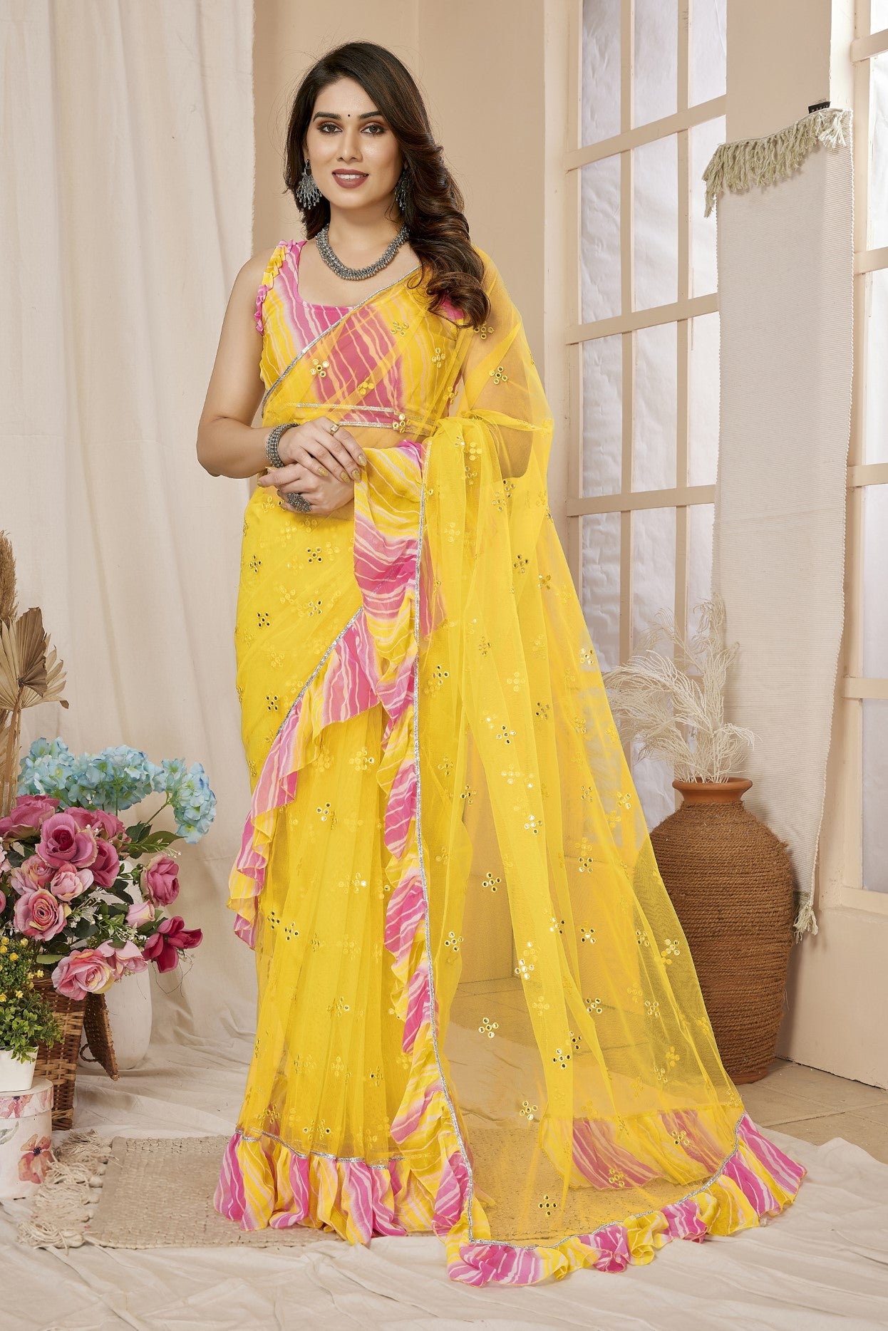 Yellow Net Saree with Mirror Work & Ruffle with Leheriya Blouse