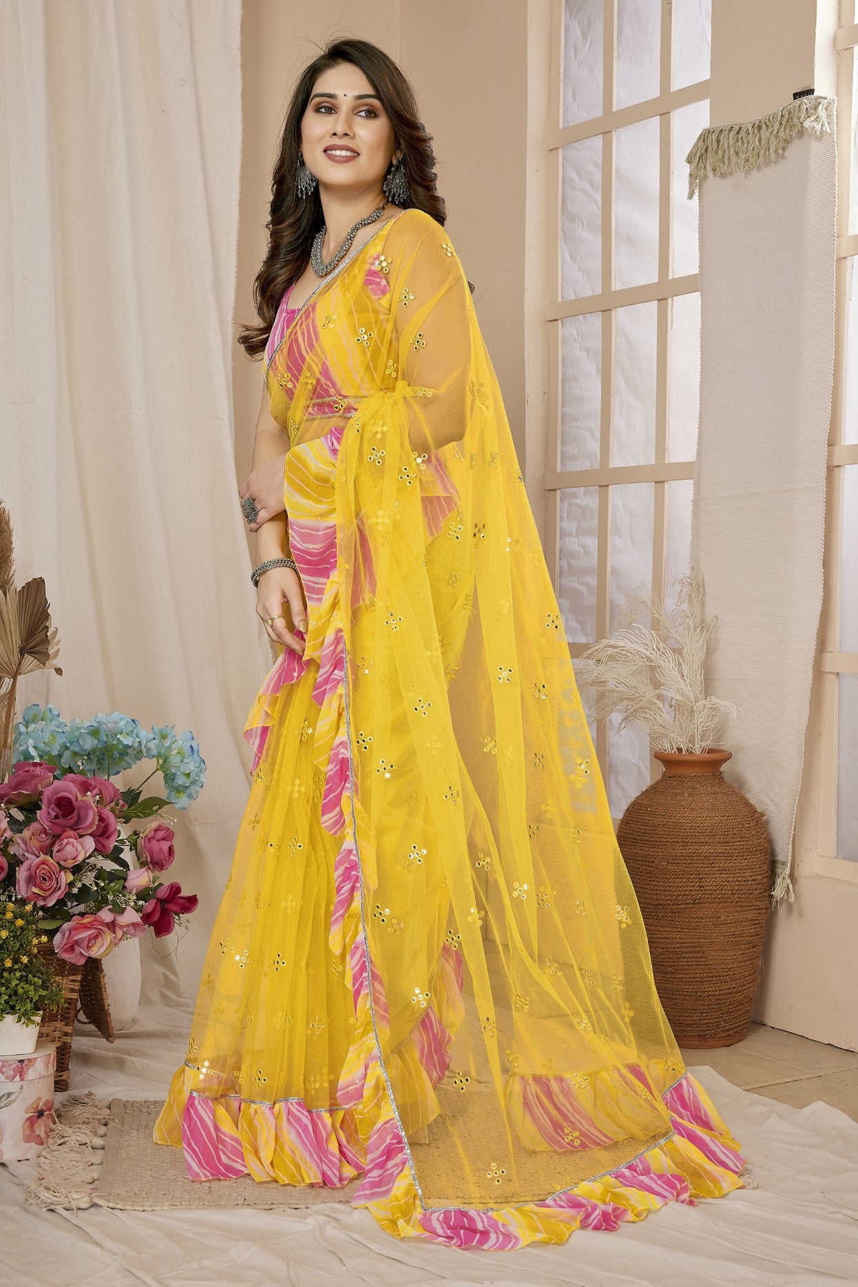 Yellow Net Saree with Mirror Work & Ruffle with Leheriya Blouse