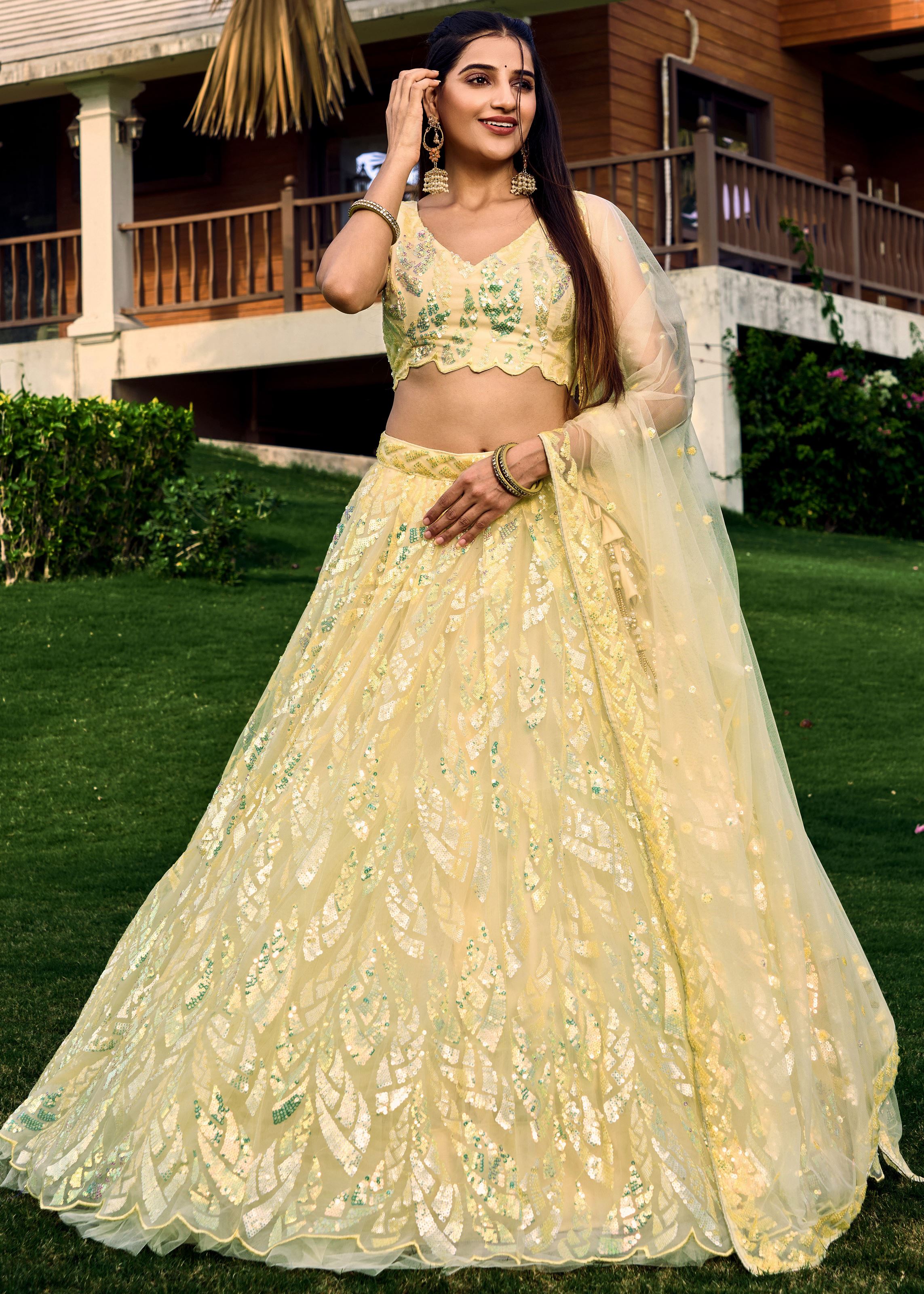 Yellow Soft Net Lehenga Choli With Multiple Sequins, Thread Embroidery Work